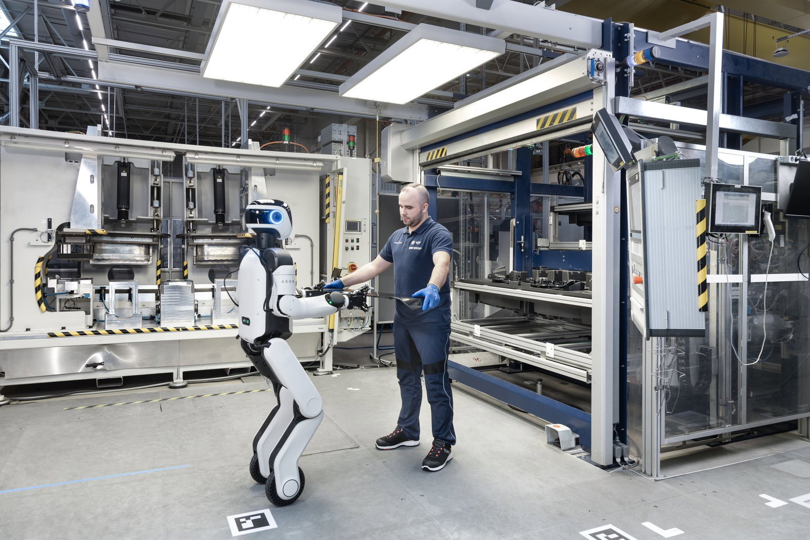Robot worker AEON in a BMW factory