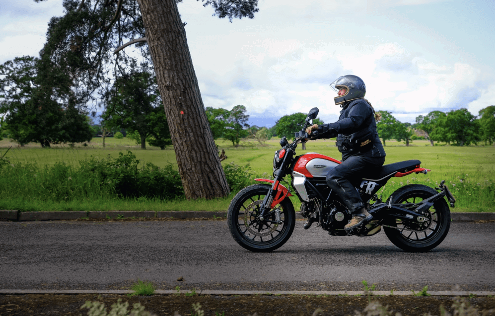 A member of the club riding a Ducati. Photo credit - Ducati Dragons