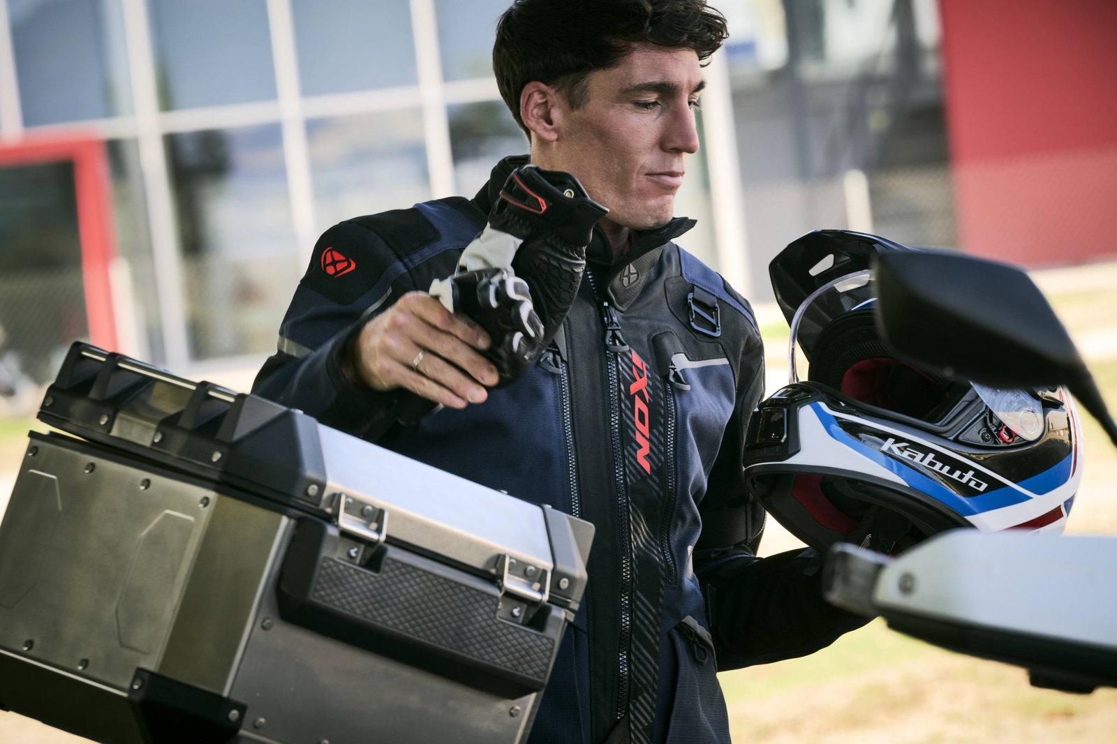 MotoGP test rider Alexi Espargaro wearing a Honda x Ixon jacket.