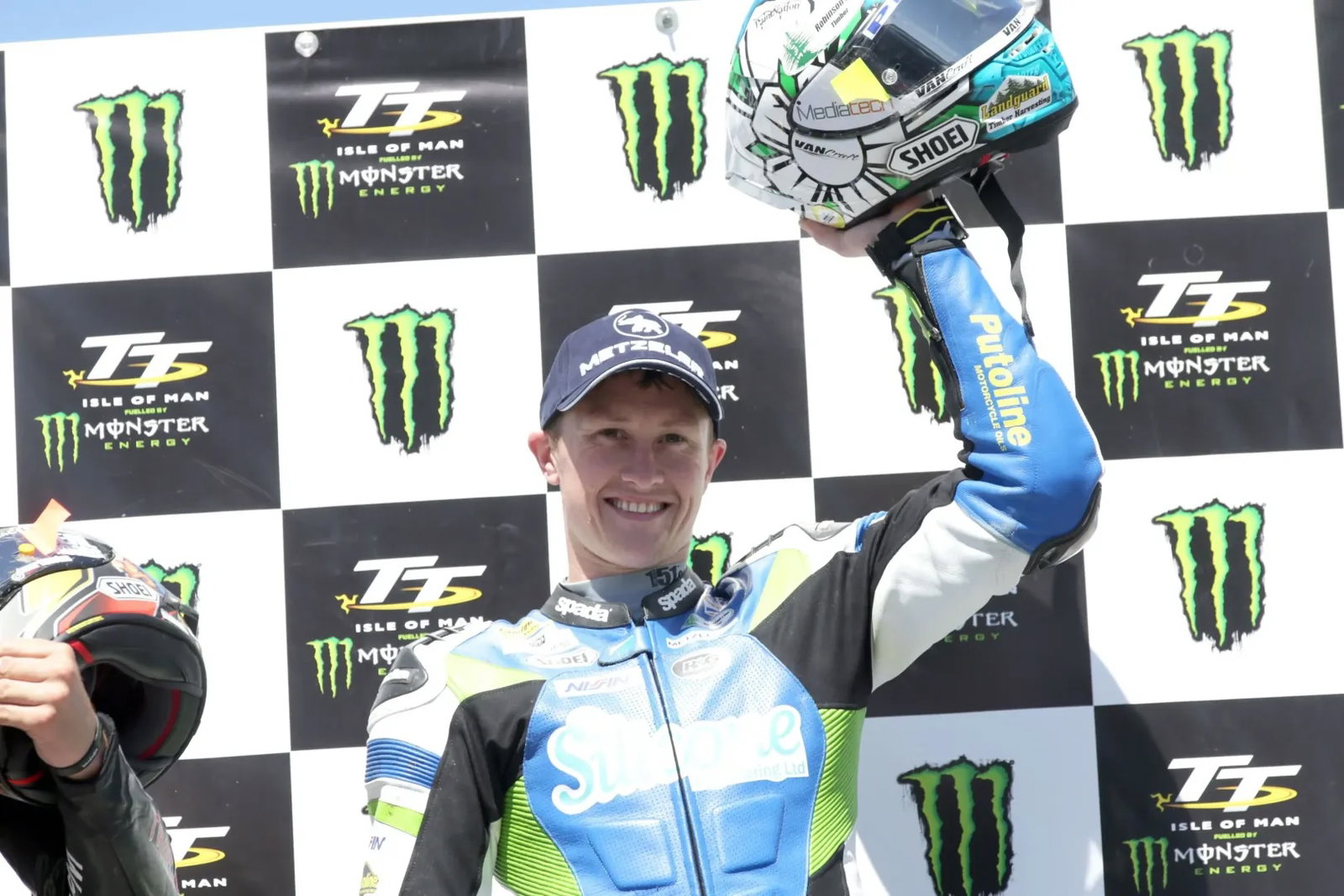 Dean Harrison on the podium at the Isle of Man TT