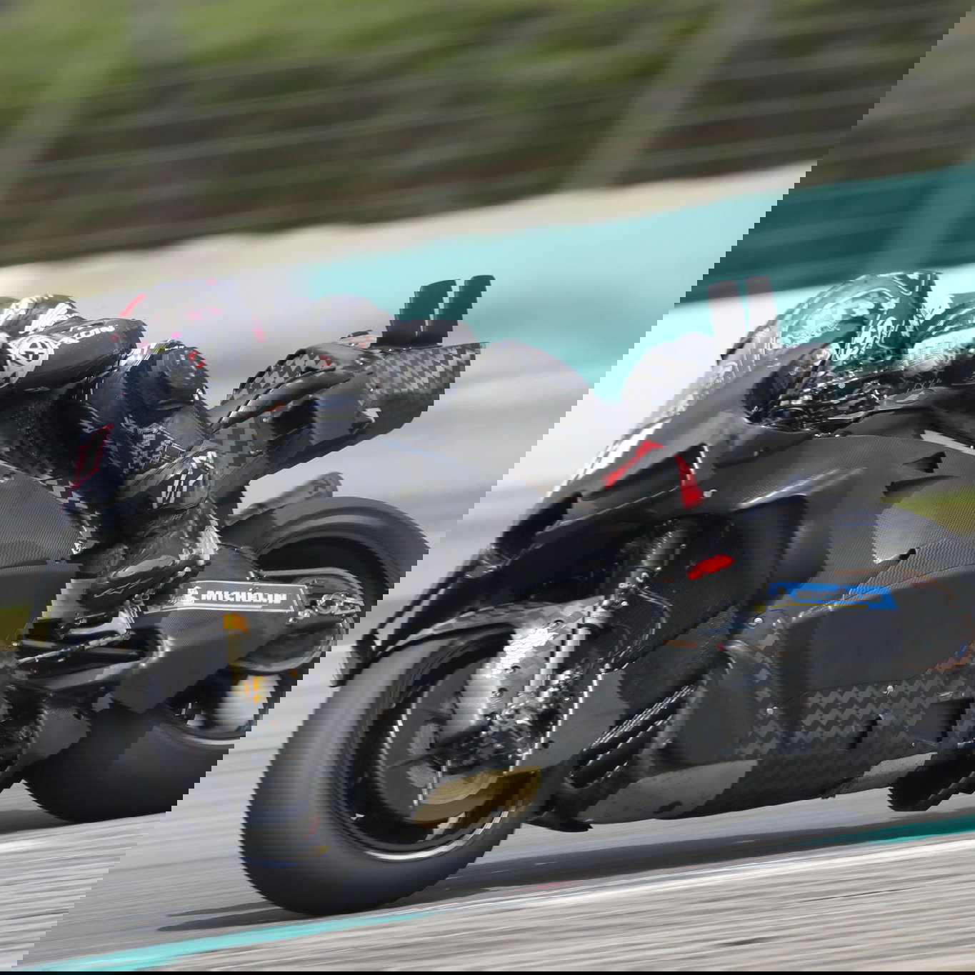 Aleix Espargaro riding a Honda MotoGP bike. Photo credit - Gold and Goose