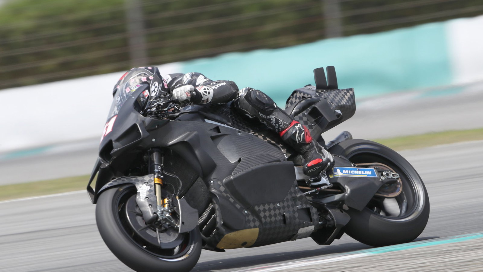 Aleix Espargaro riding a Honda MotoGP bike. Photo credit - Gold and Goose