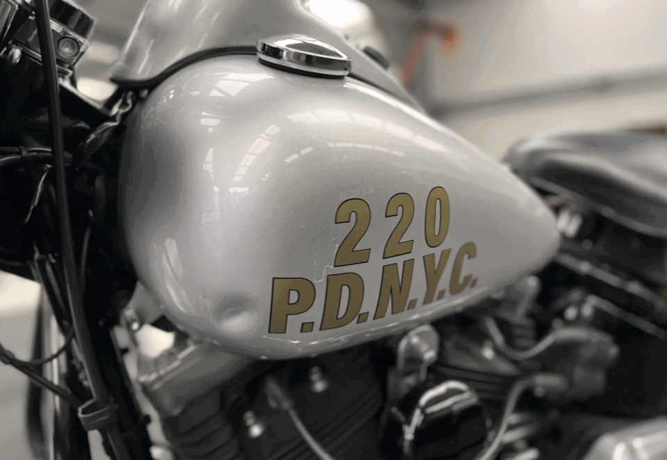 The bike's customised tank. Photo credit - Iconic Auctioneers