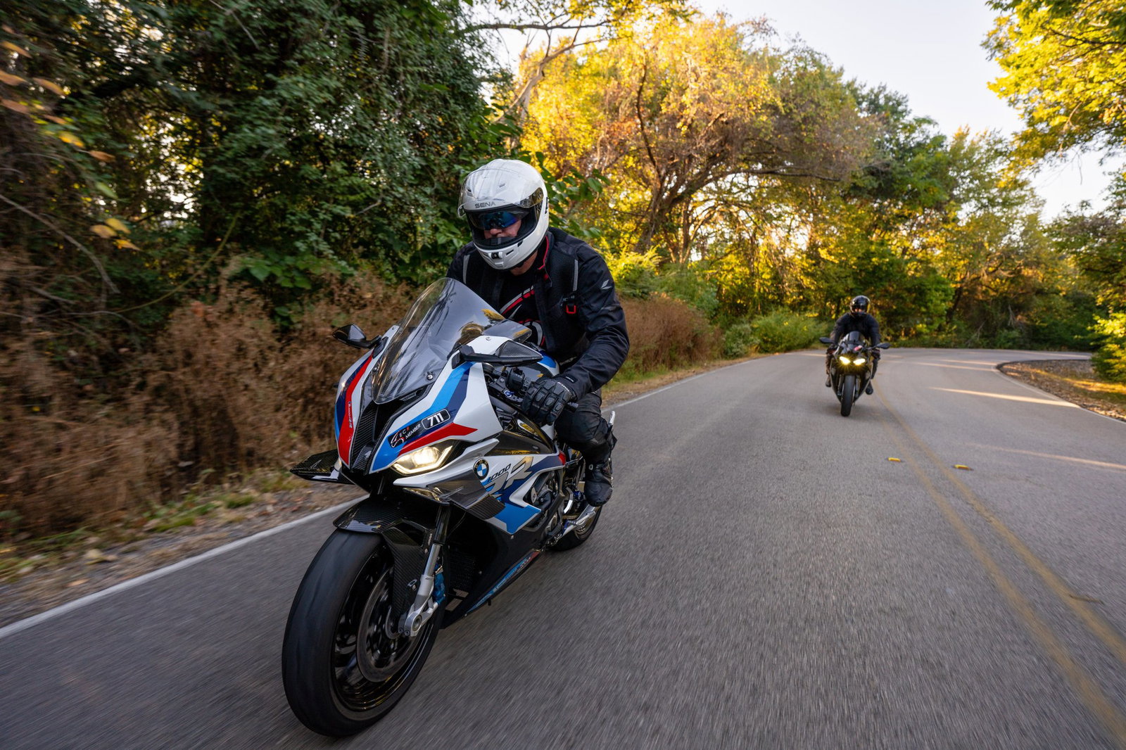 Rider wearing the Sena Phantom ANC on the road. 