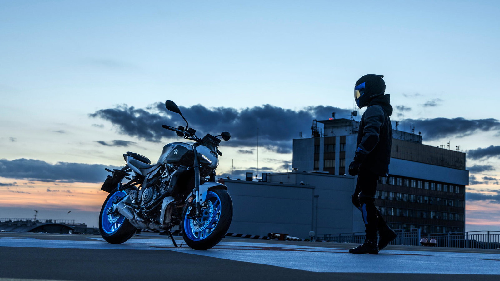 A Yamaha MT-07 in front of an industrial building