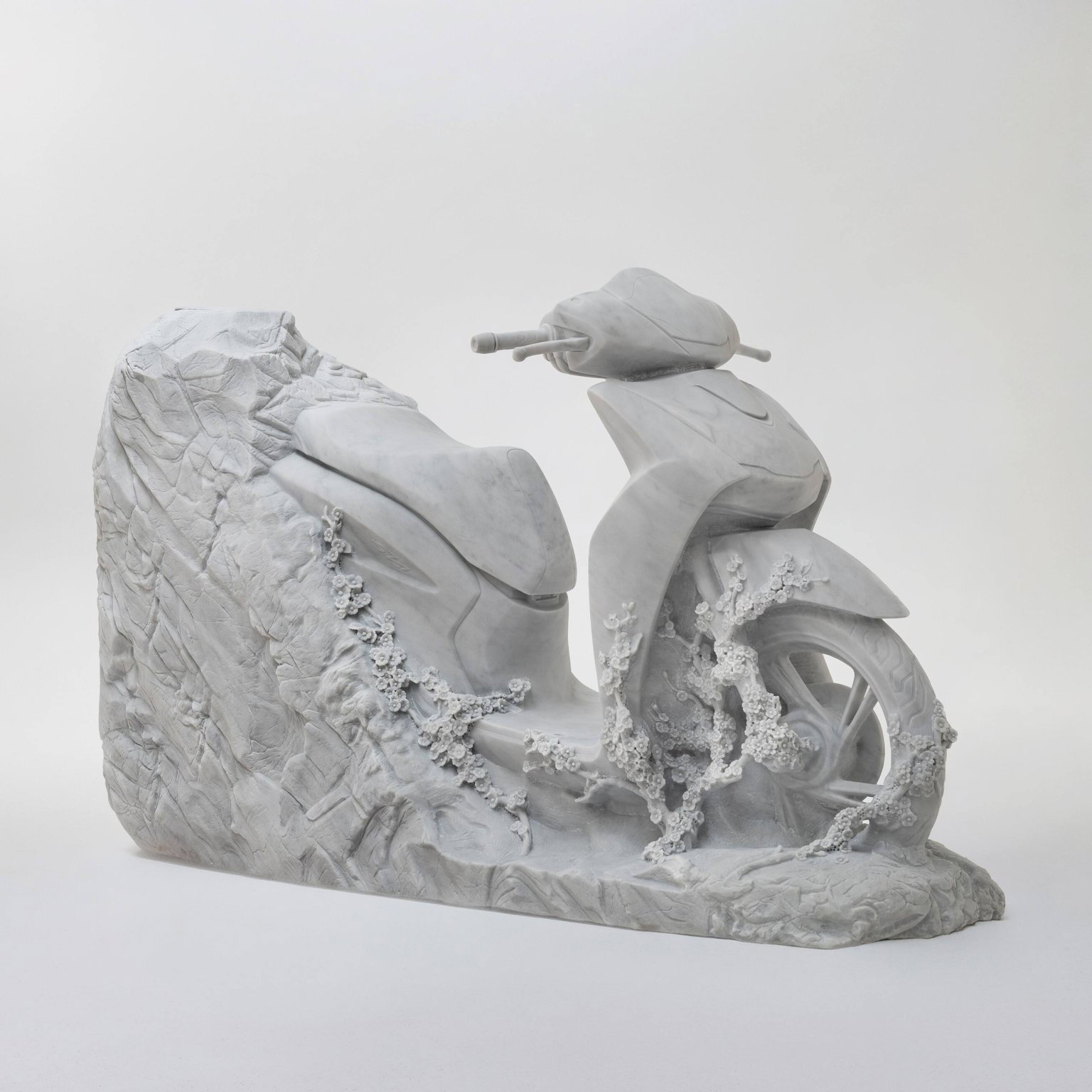 A marble Honda SH125i scooter