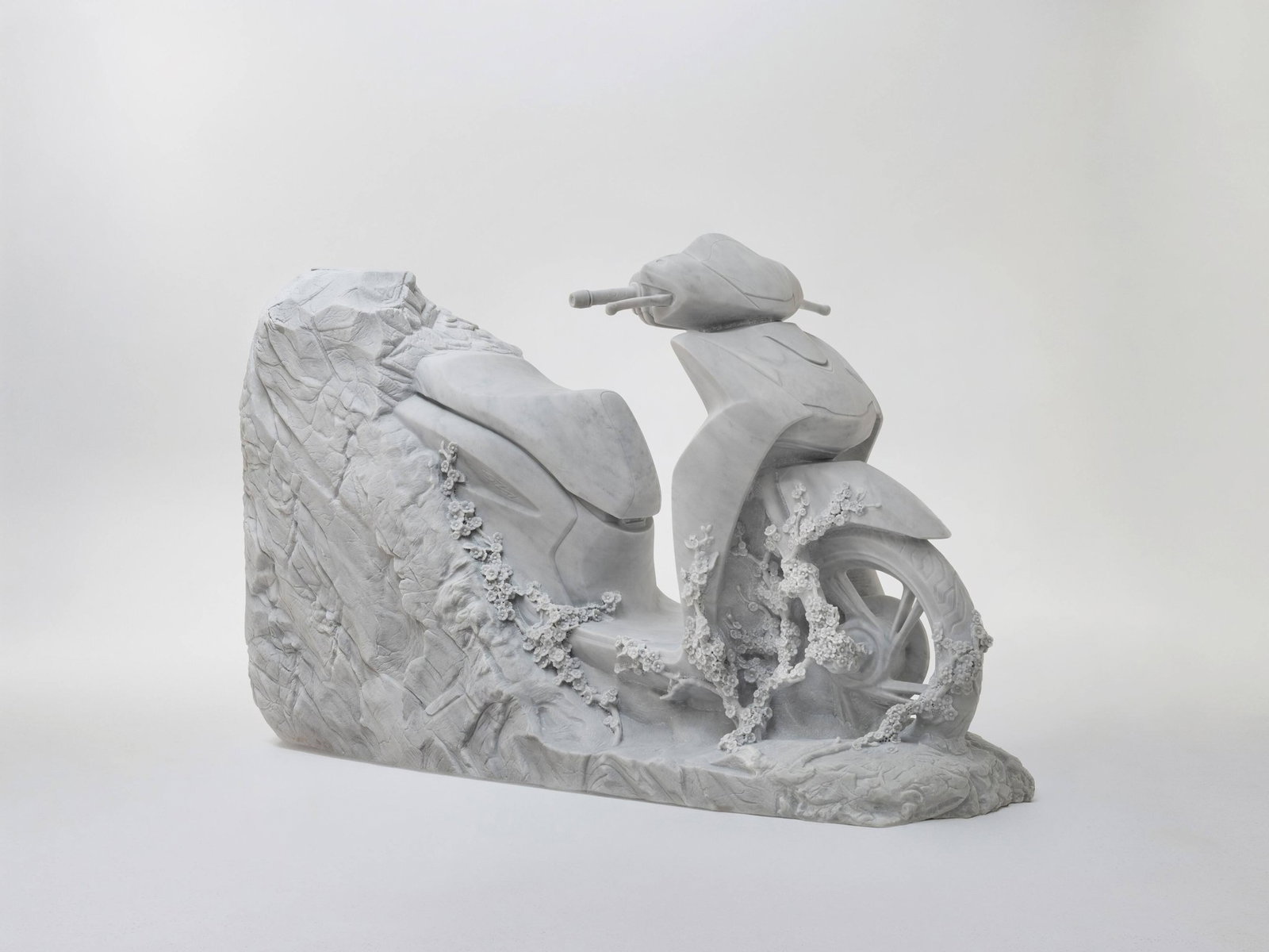 A marble Honda SH125i scooter