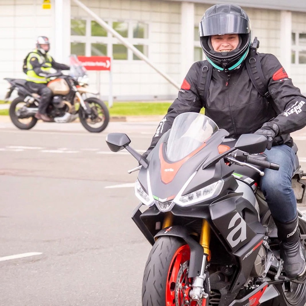 A happy rider on an Aprilia