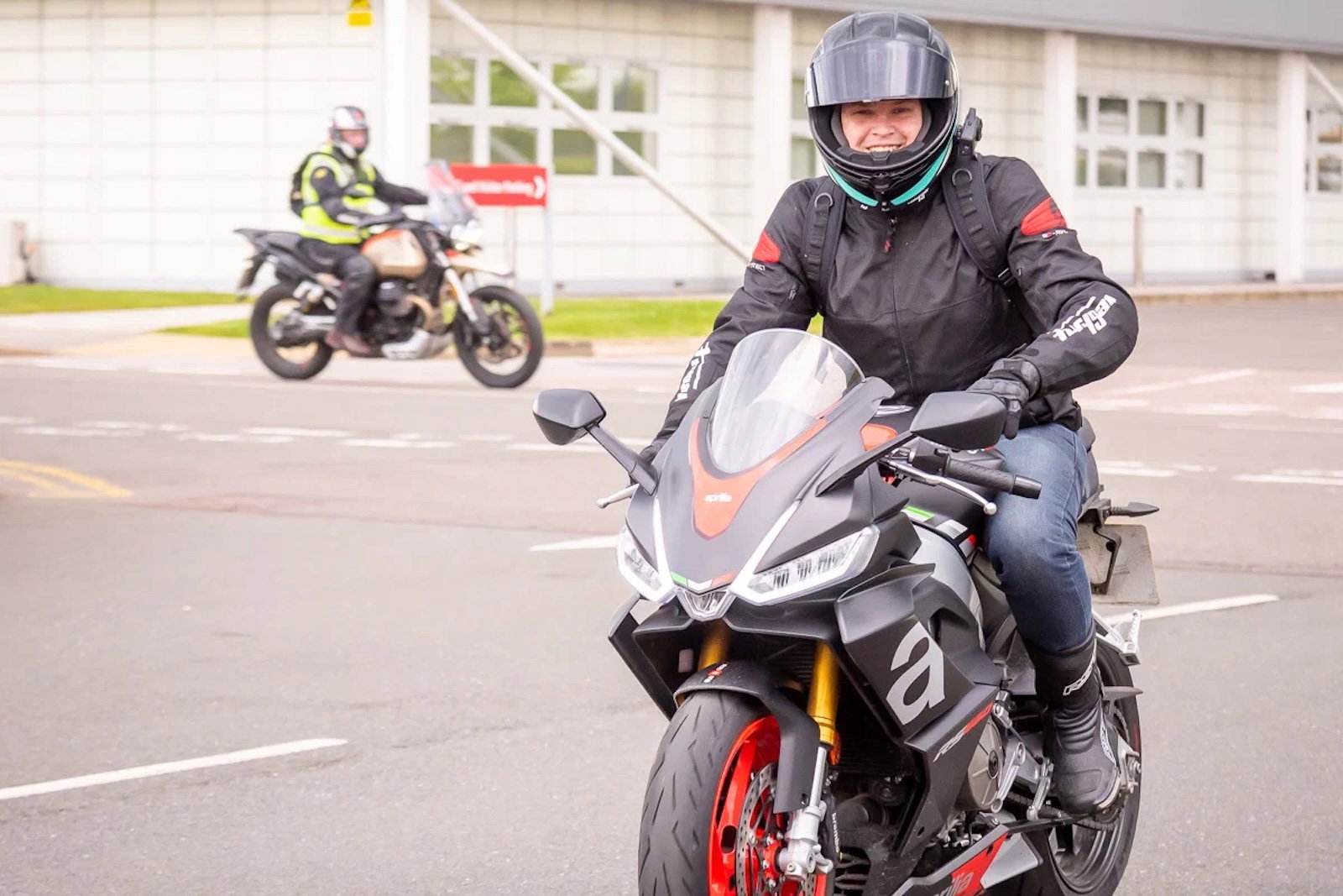 A happy rider on an Aprilia