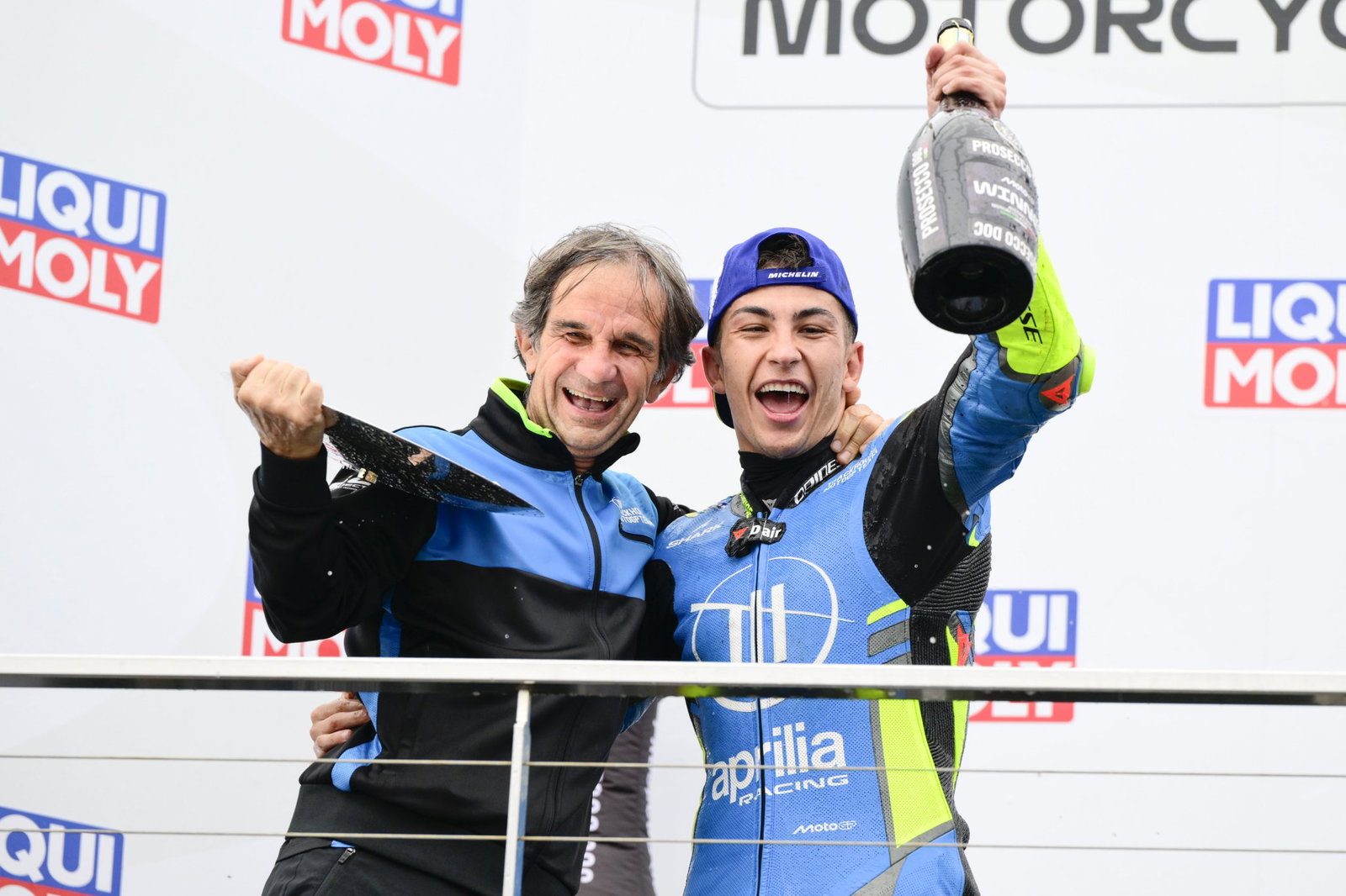 Davide Brivio celebrating a win with Raul Fernandez. Credit: Gold and Goose.