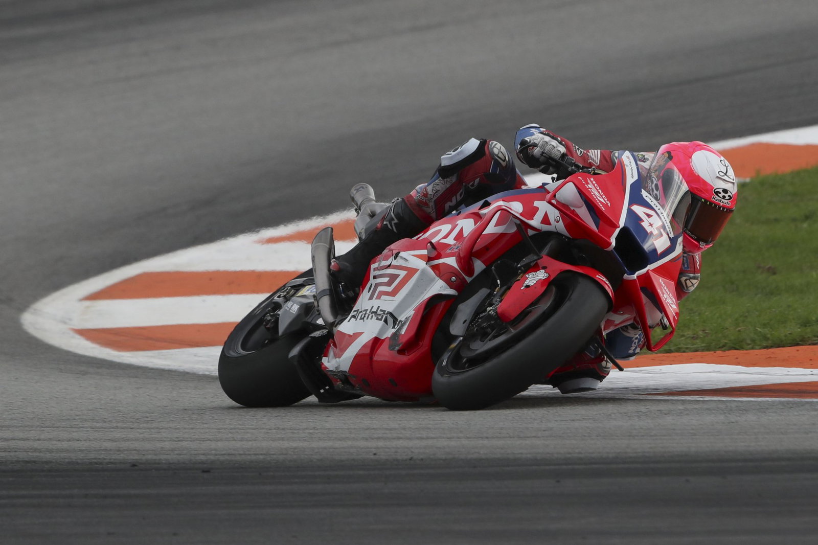 Aleix Espargaro riding a Honda MotoGP bike. Credit - Gold and Goose.