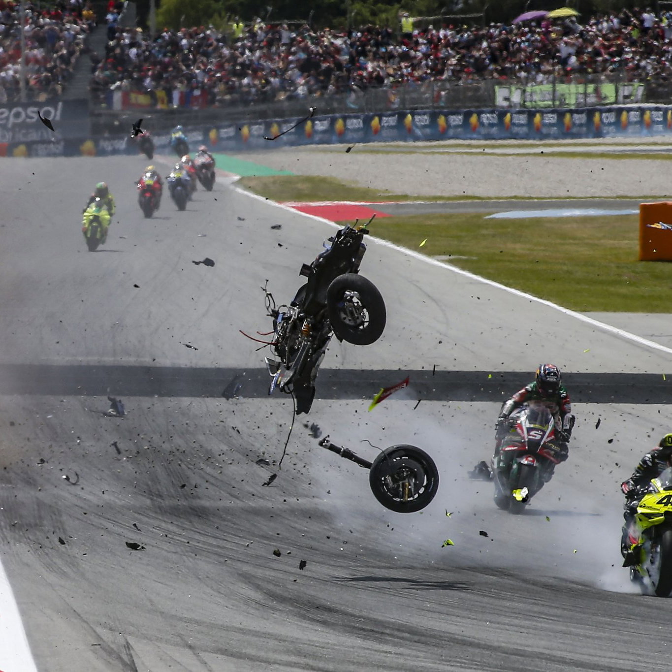 Alex Marquez' Ducati MotoGP bike flying through the air. Credit: Gold and Goose.