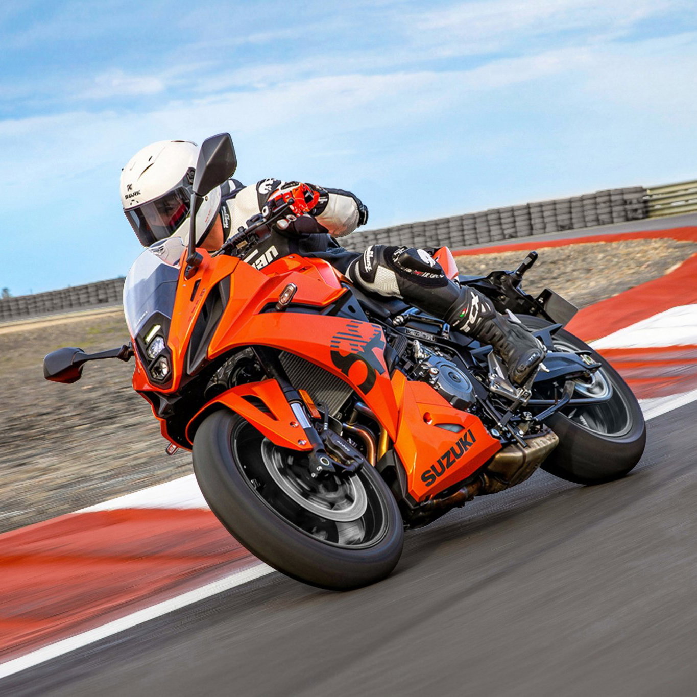 New Suzuki GSX-8R in orange on a track.