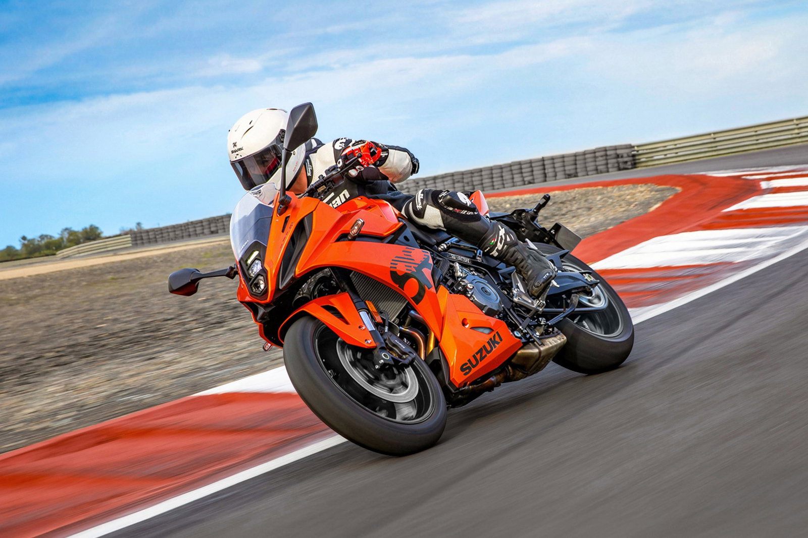 New Suzuki GSX-8R in orange on a track.