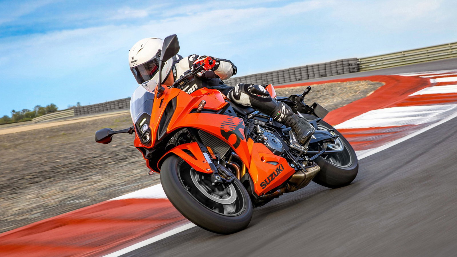 New Suzuki GSX-8R in orange on a track.
