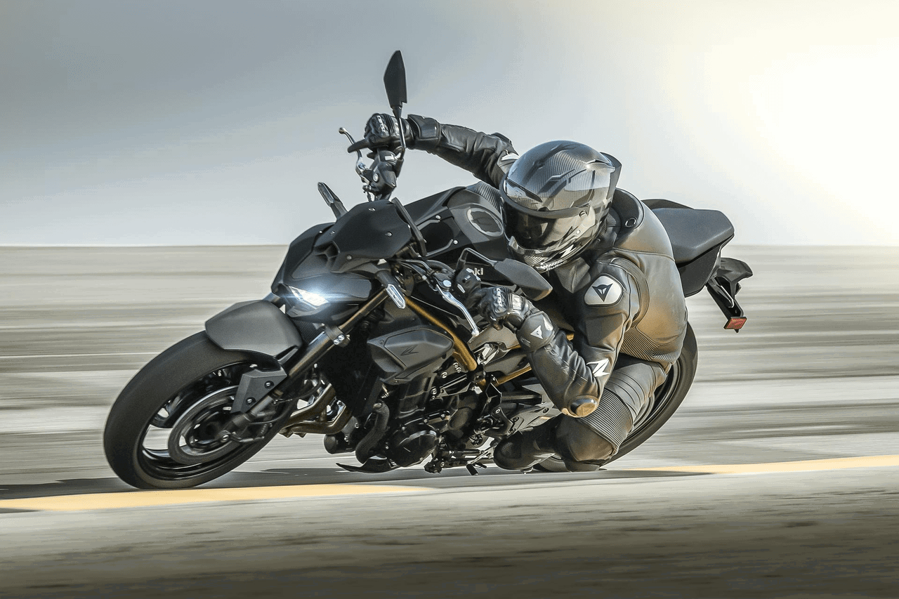 A Kawasaki Z900 being ridden on track