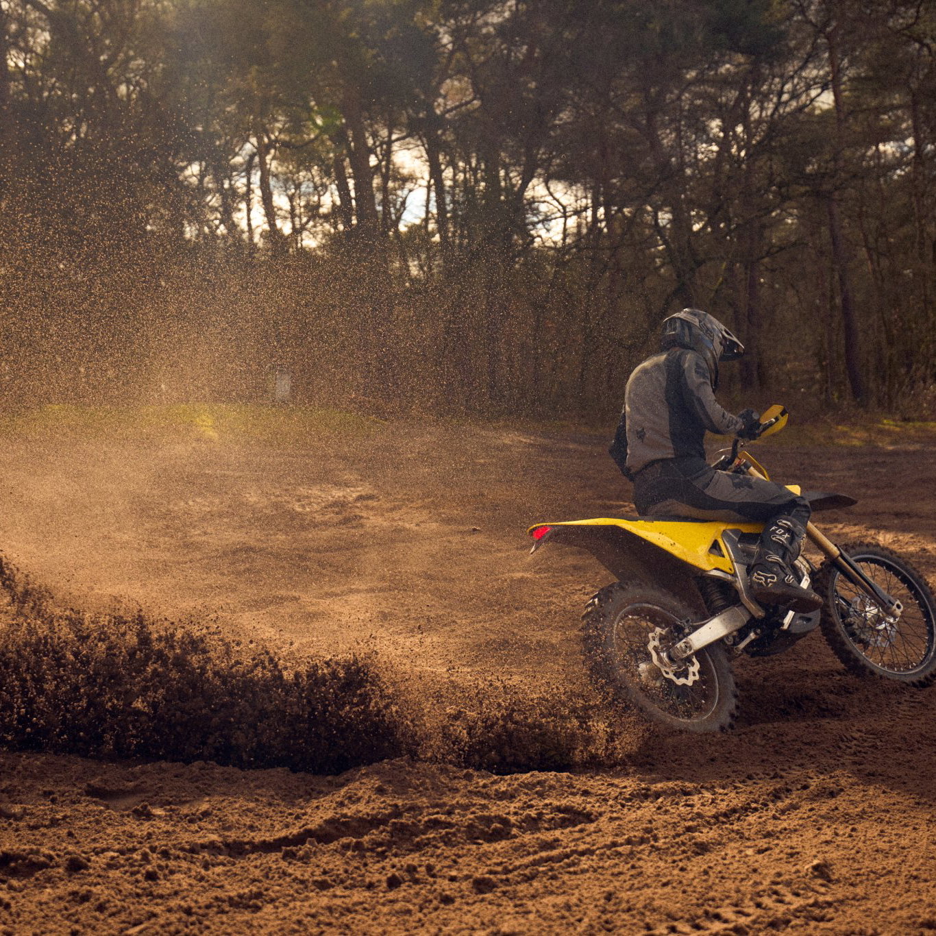 The Radian EXR electric enduro bike wheel-spinning in dirt