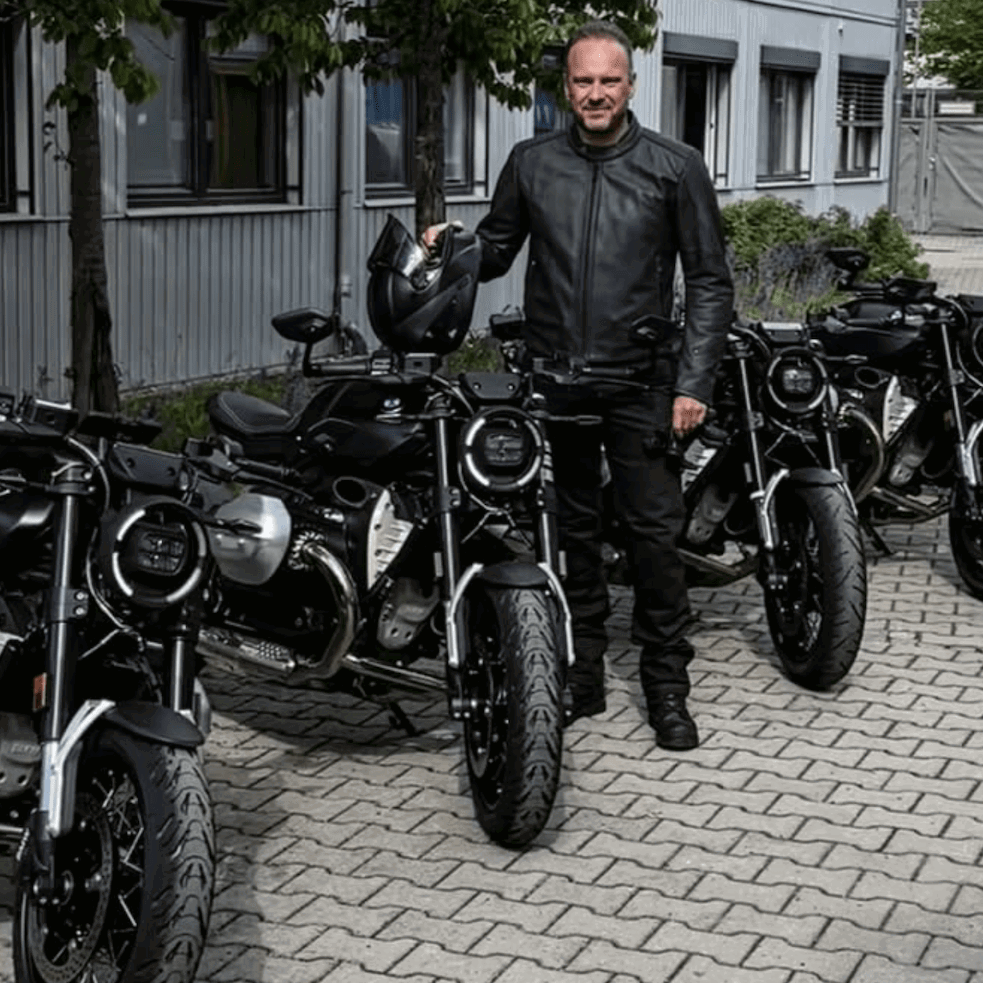 BMW CEO Markus Flasch alongside the upcoming BMW R20