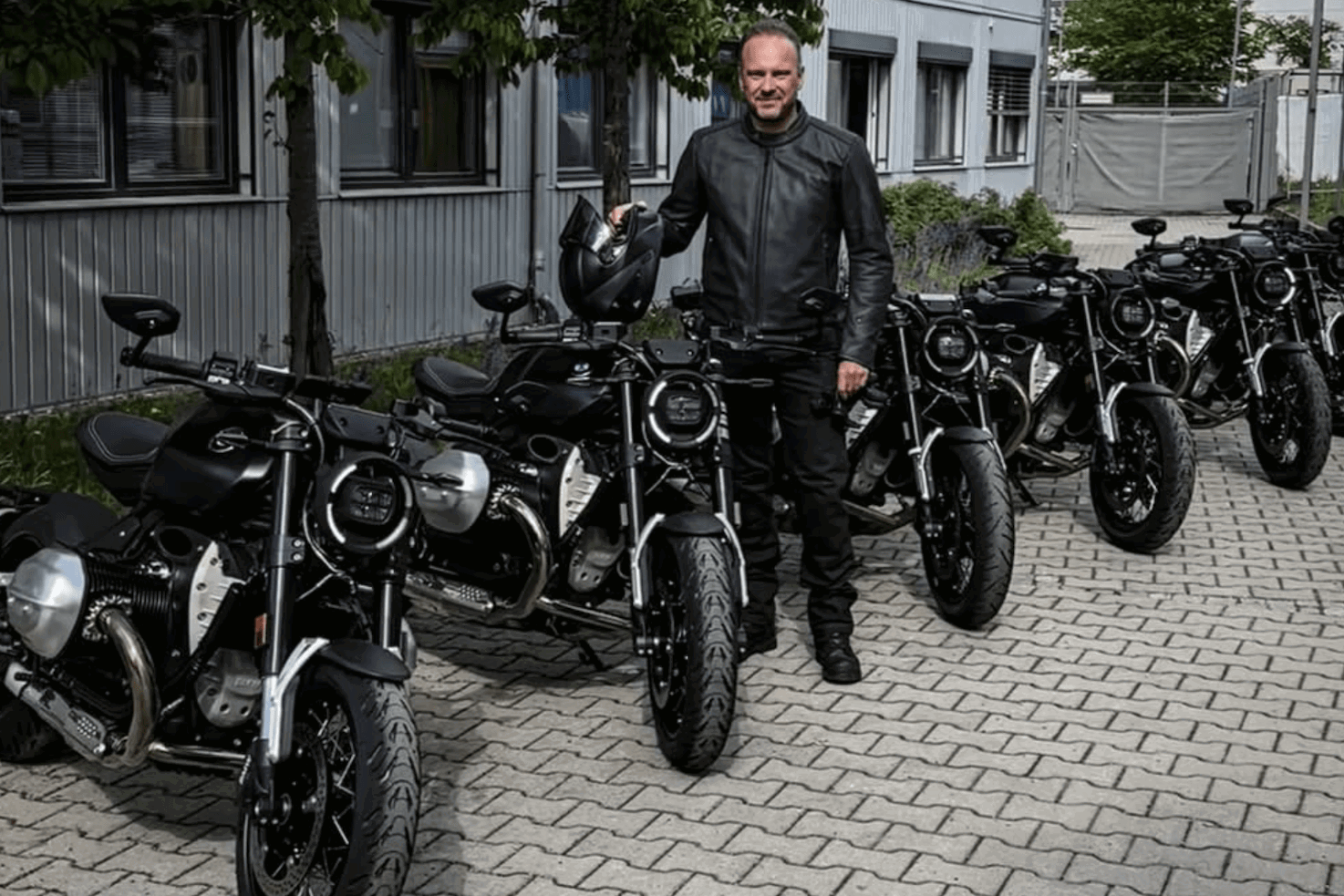 BMW CEO Markus Flasch alongside the upcoming BMW R20