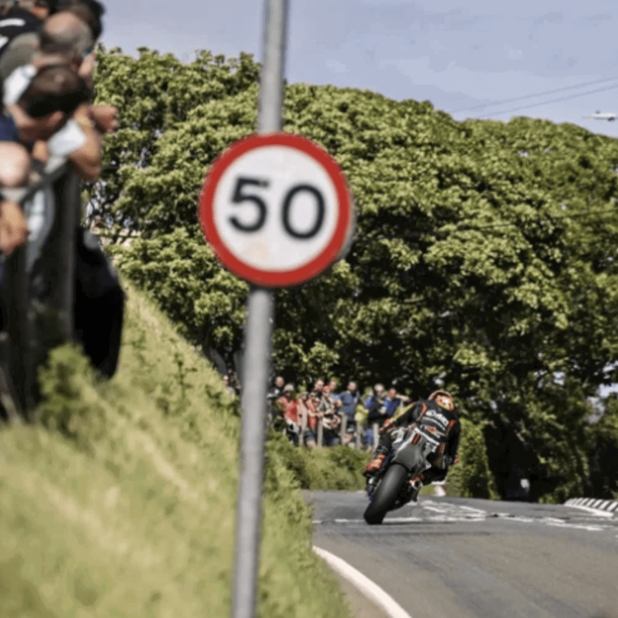 A rider and spectators at the TT. Credit: Isle of Man TT.