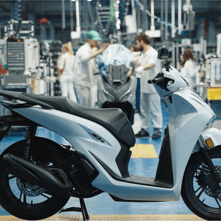 Honda SH125i scooter at a factory.