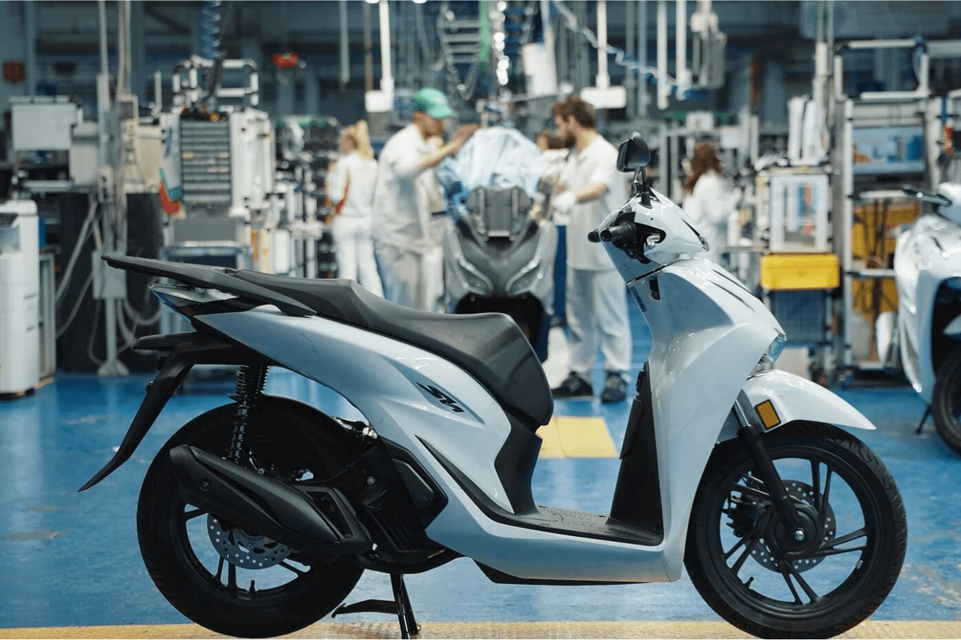 Honda SH125i scooter at a factory.