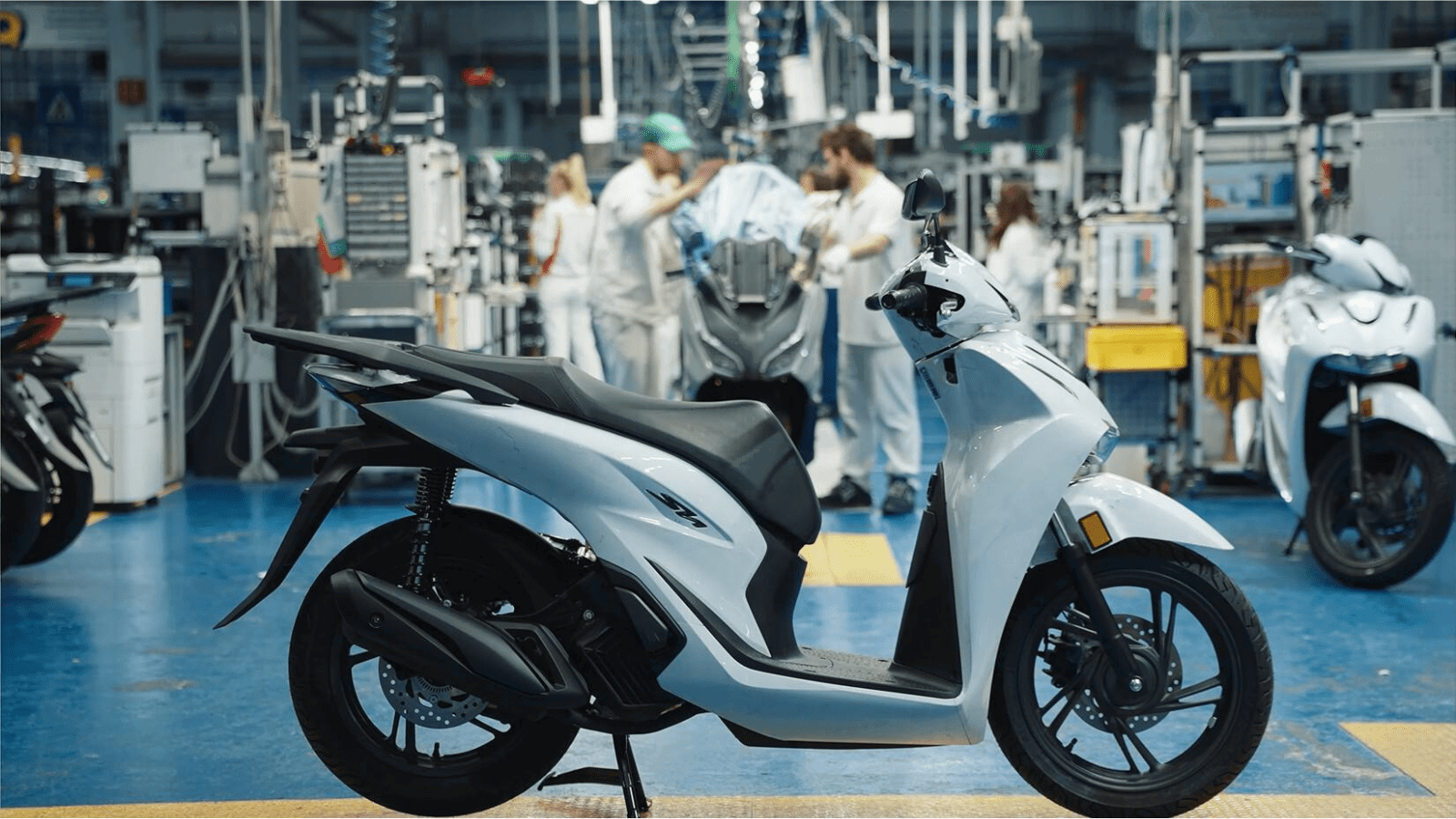 Honda SH125i scooter at a factory.