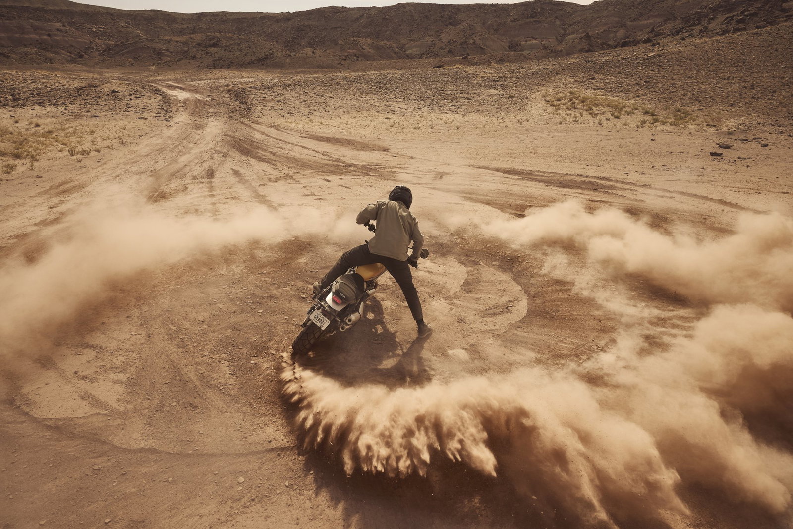 Triumph Scrambler 900 riding off-road.