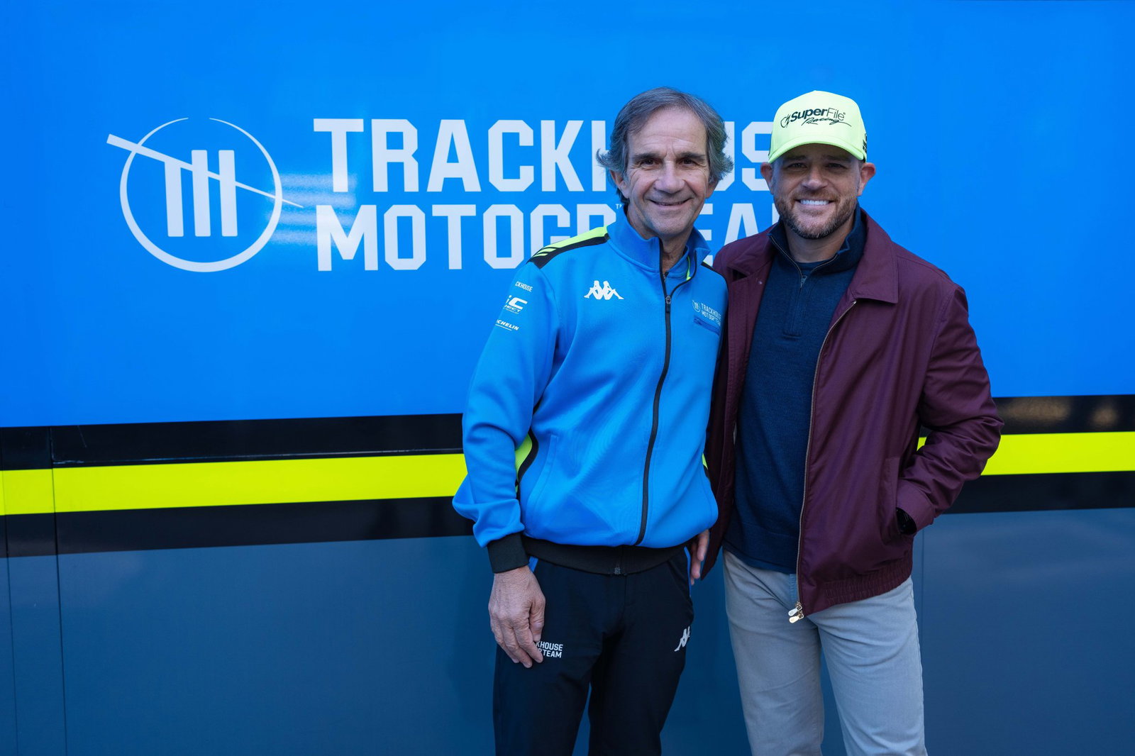 Davide Brivio with Trackhouse team owner Justin Marks at the 2026 Catalan MotoGP.