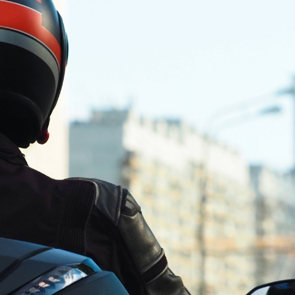 A scooter in a high rise urban environment
