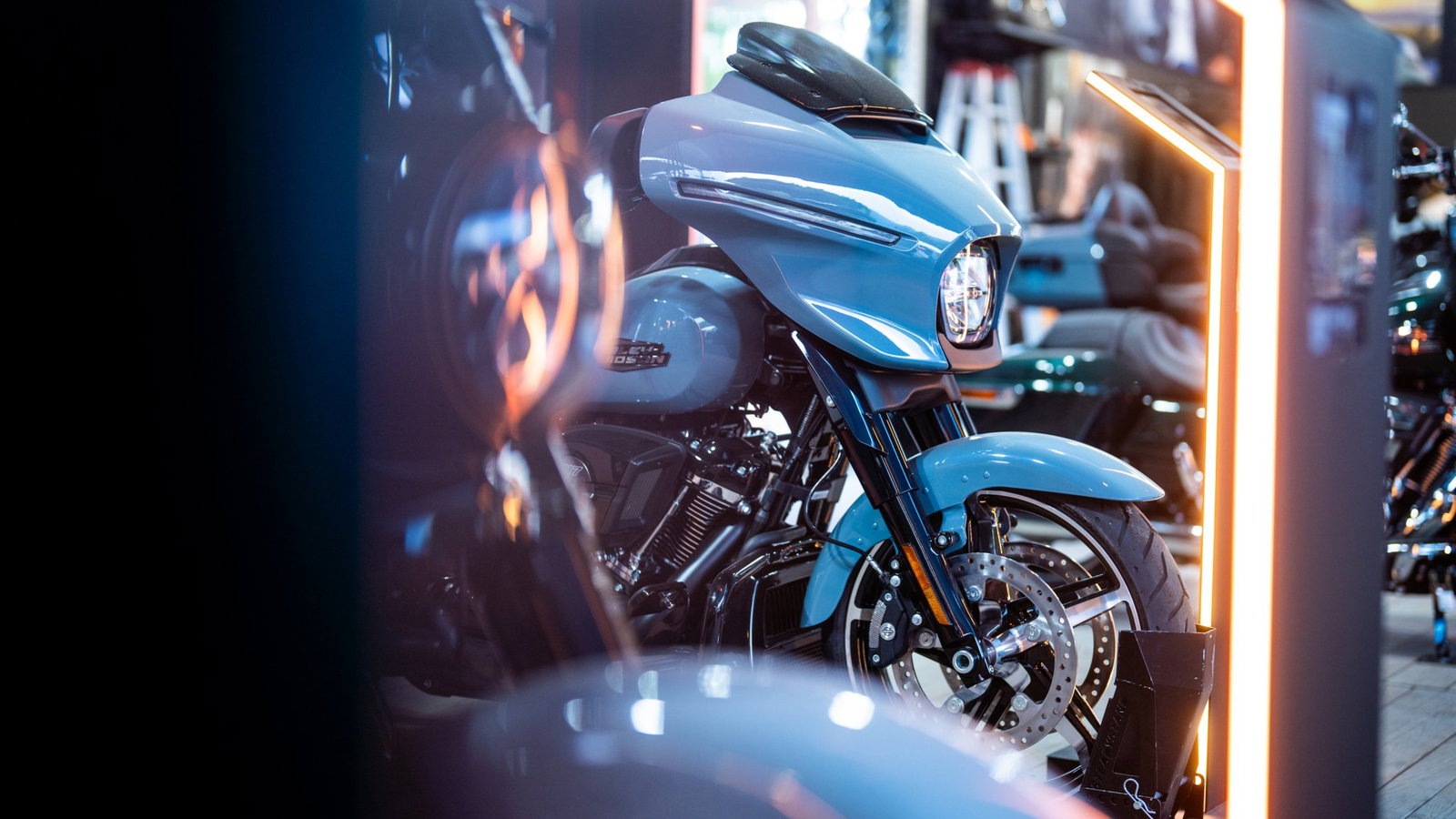 Harley-Davidson motorcycle on stage at an event.