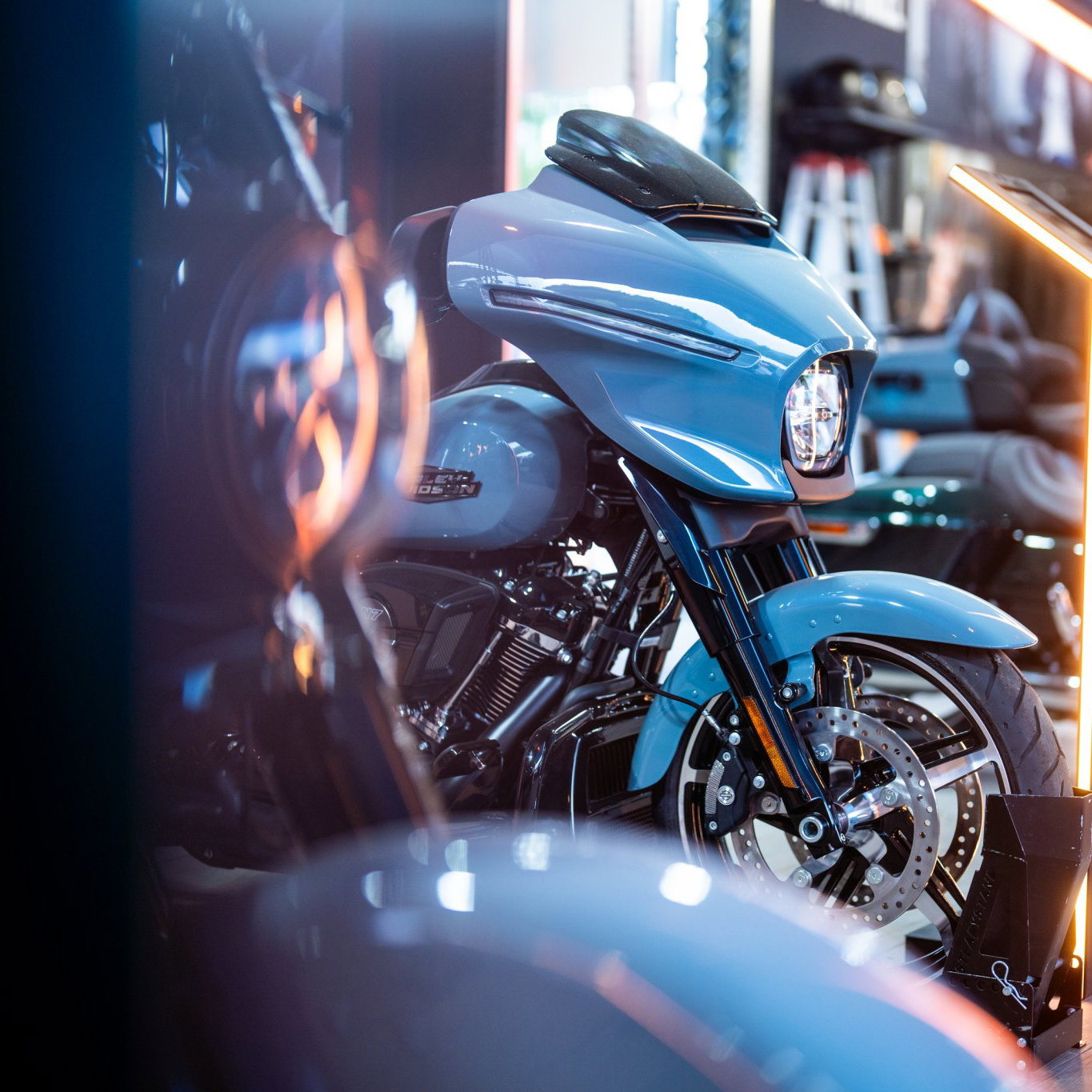 Harley-Davidson motorcycle on stage at an event.