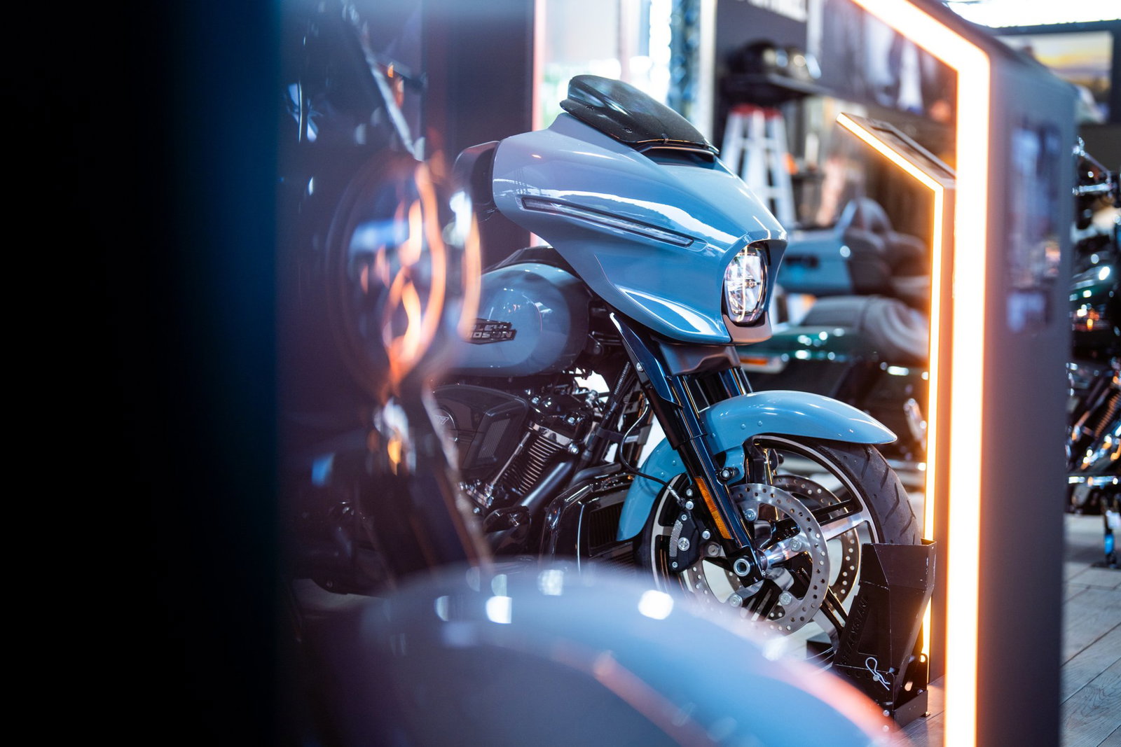 Harley-Davidson motorcycle on stage at an event.