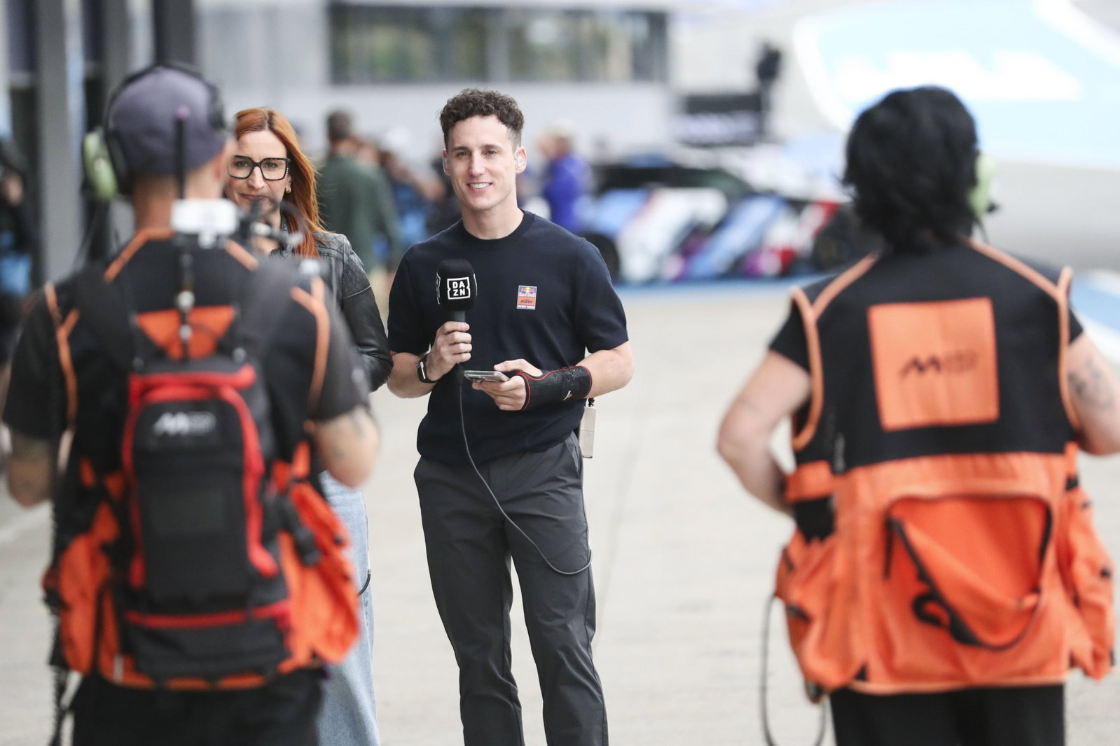 Pol Espargaro carrying out his pundit duties for DAZN. Credit: Gold and Goose.