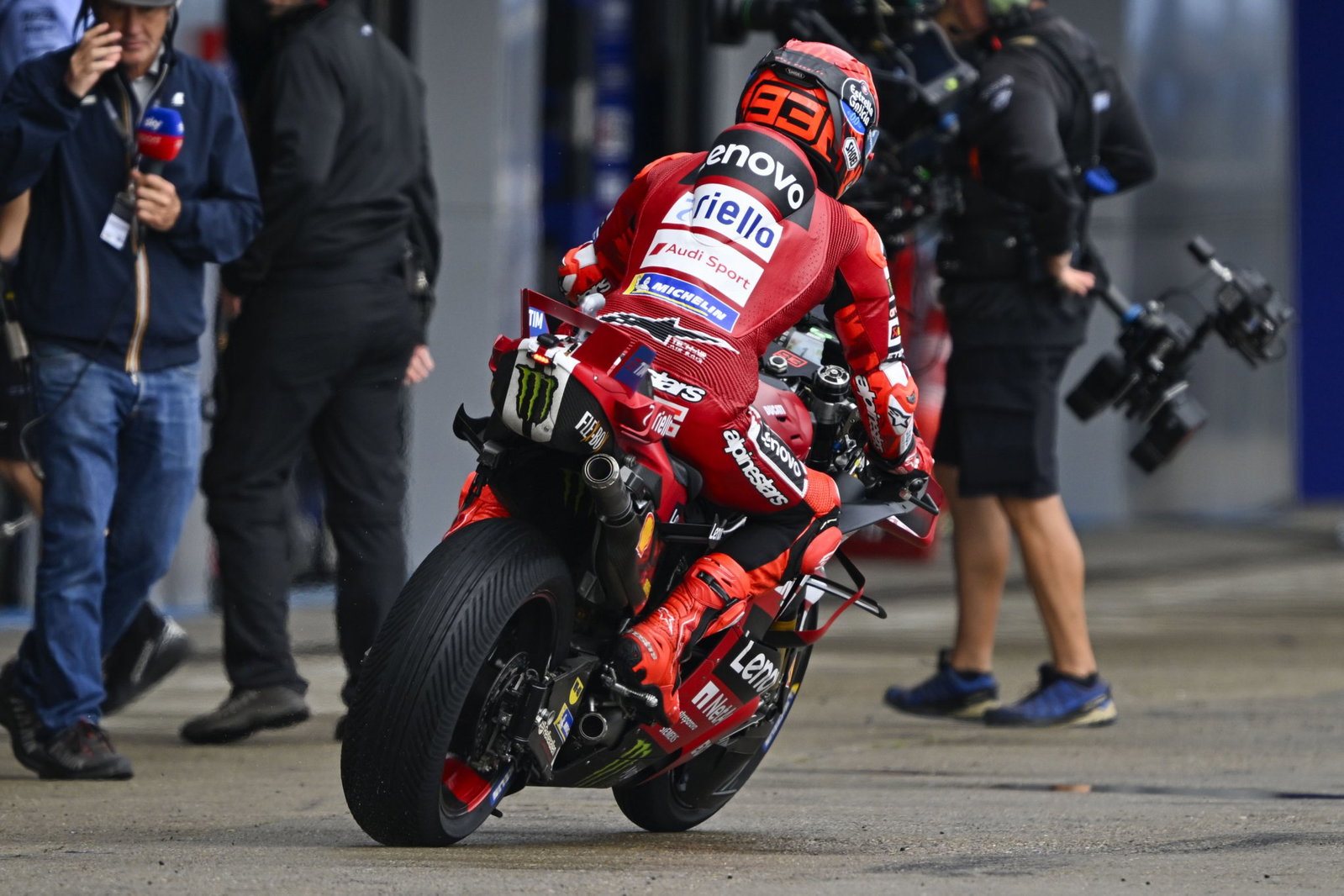 Marc Marquez in pit lane at a MotoGP race. Credit: Gold and Goose.
