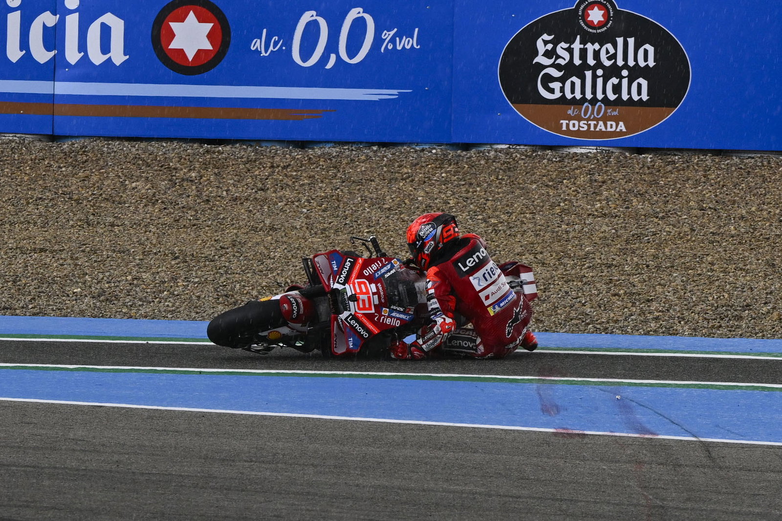 Marc Marquez crashing before entering the pits in Jerez. Credit: Gold and Goose.