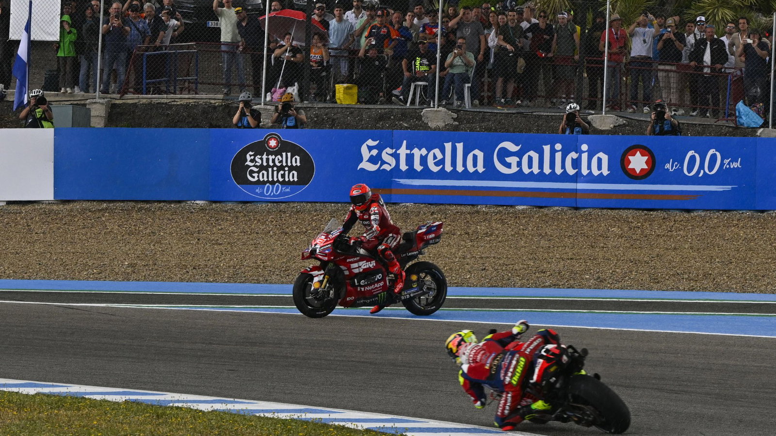 Marc Marquez waiting to cross the track at Jerez. Credit: Gold and Goose.