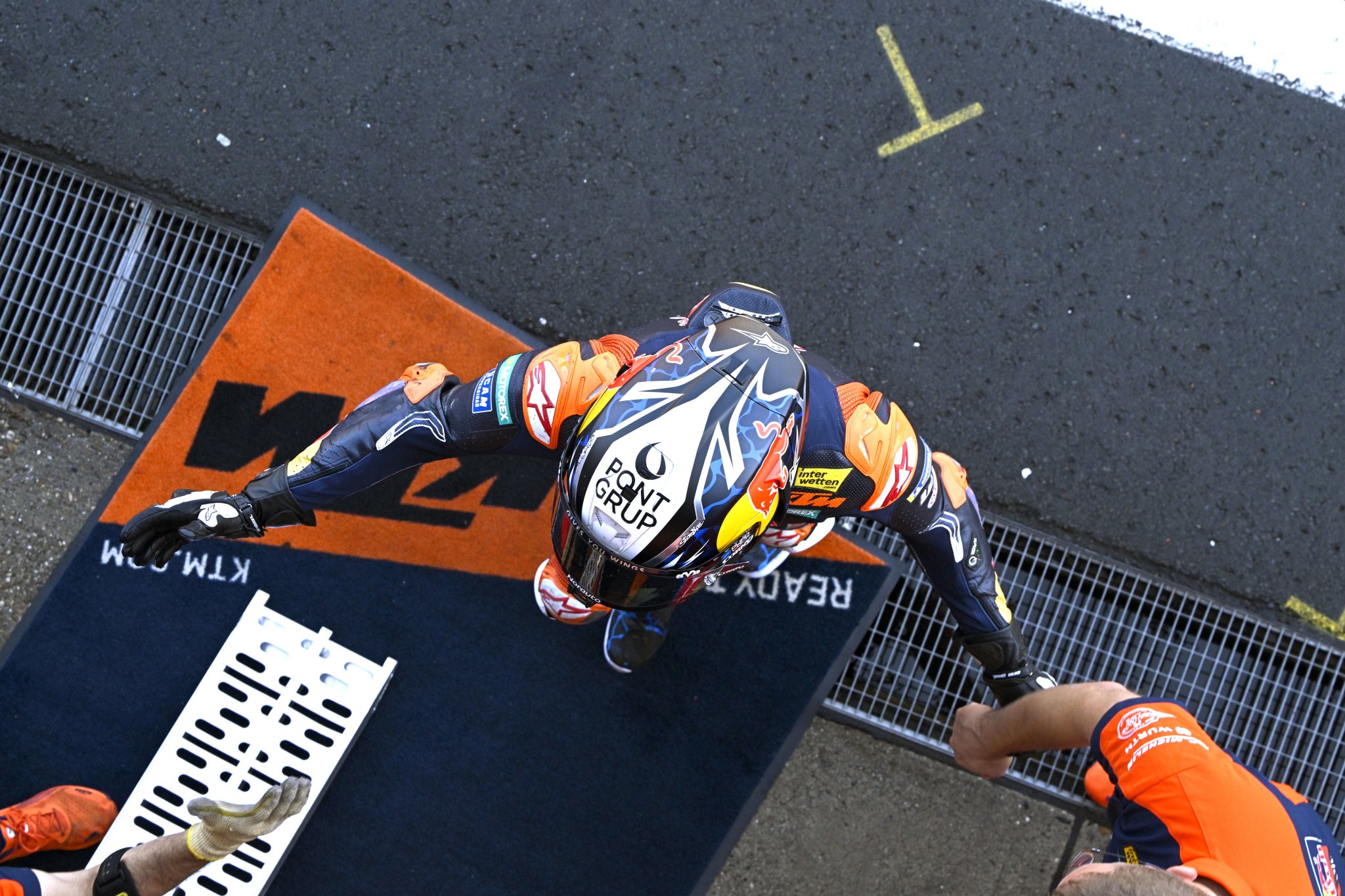 Pedro Acosta walking into the KTM garage. Credit: Gold and Goose.