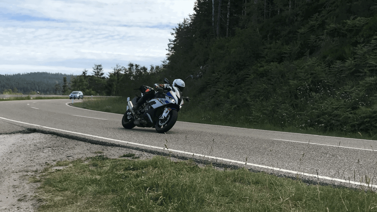 Riding a BMW on a German country road