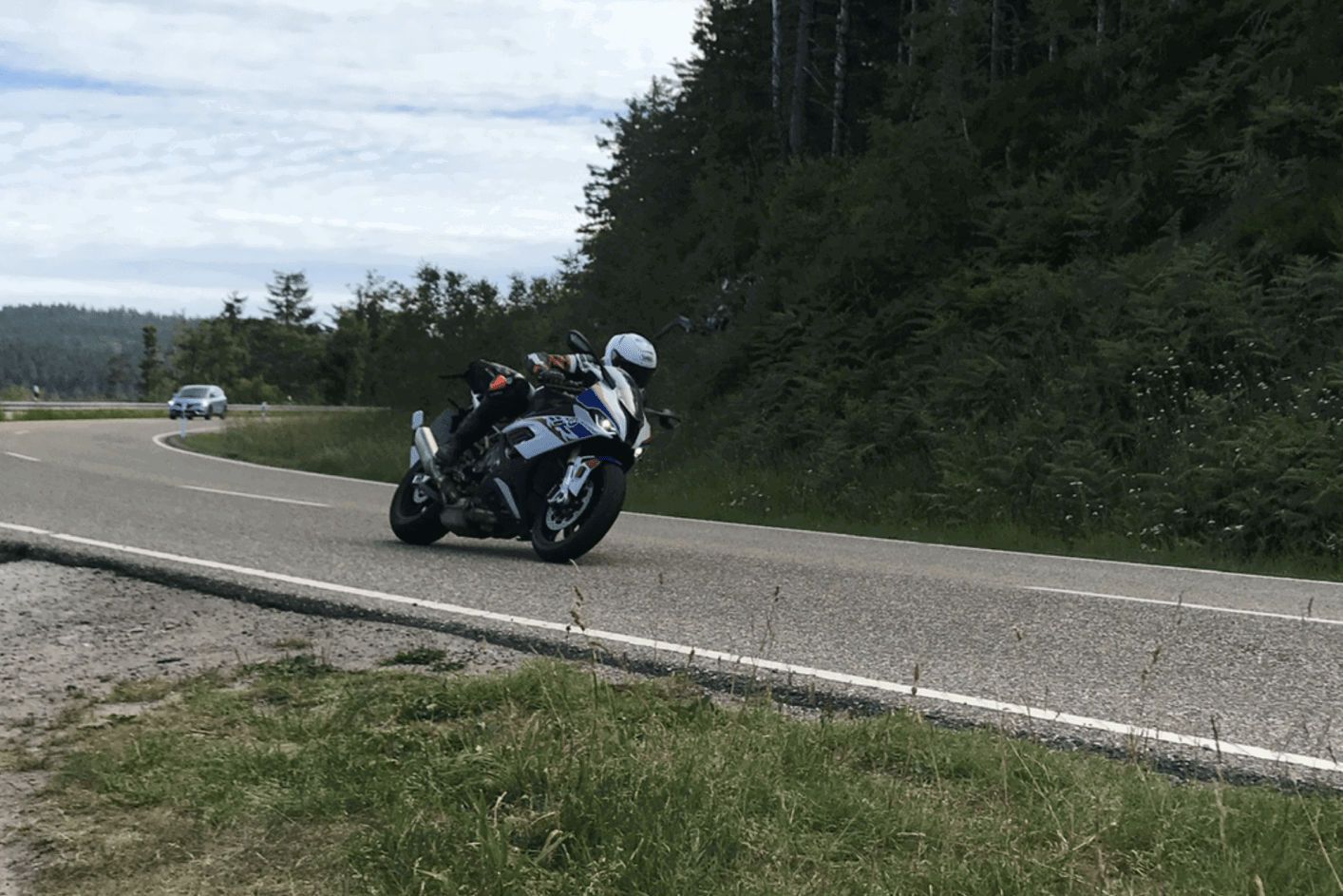Riding a BMW on a German country road