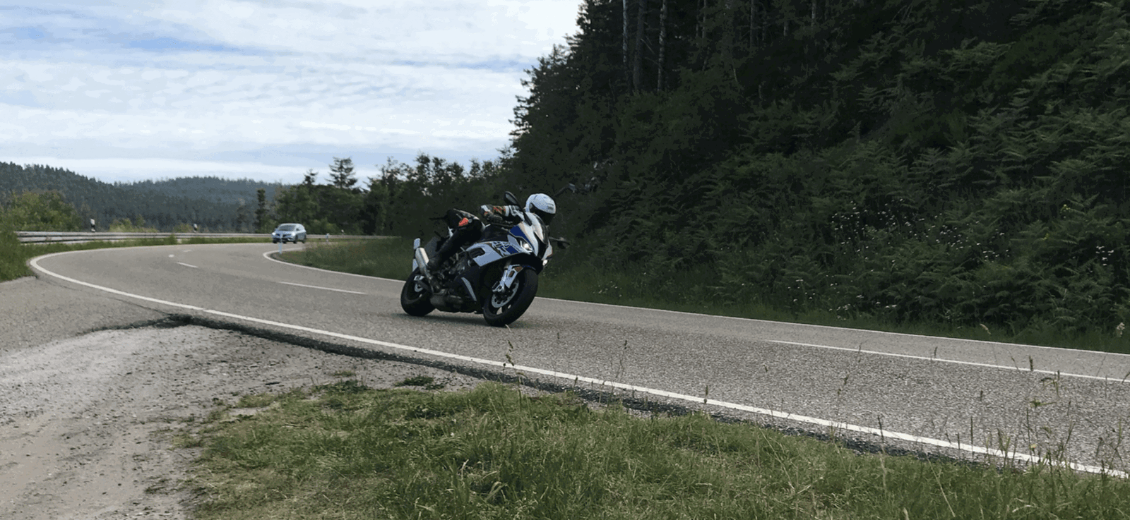 Riding a BMW on a German country road