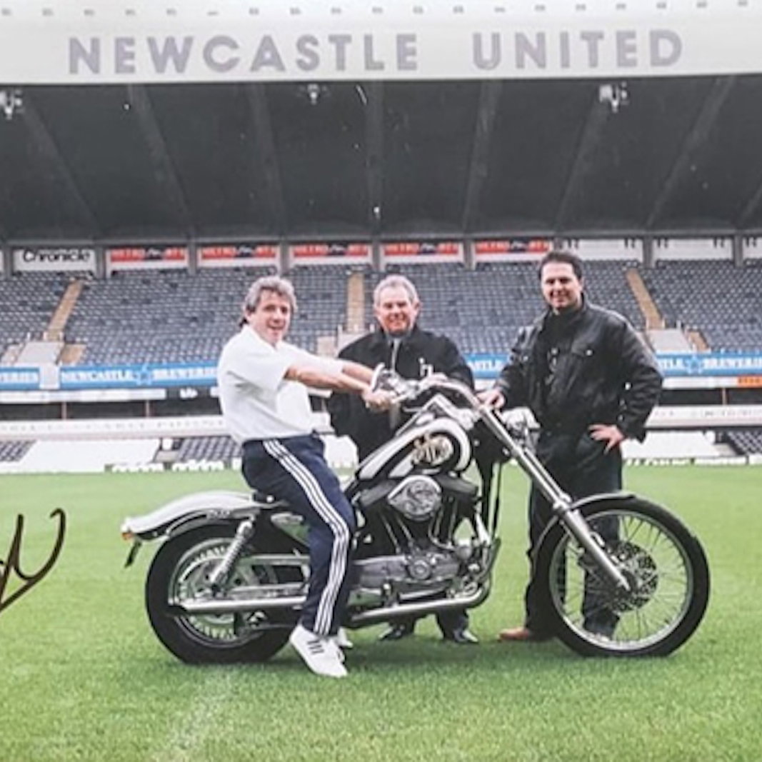 Kevin Keegan sittting on a custom Newcastle United Harley-Davidson