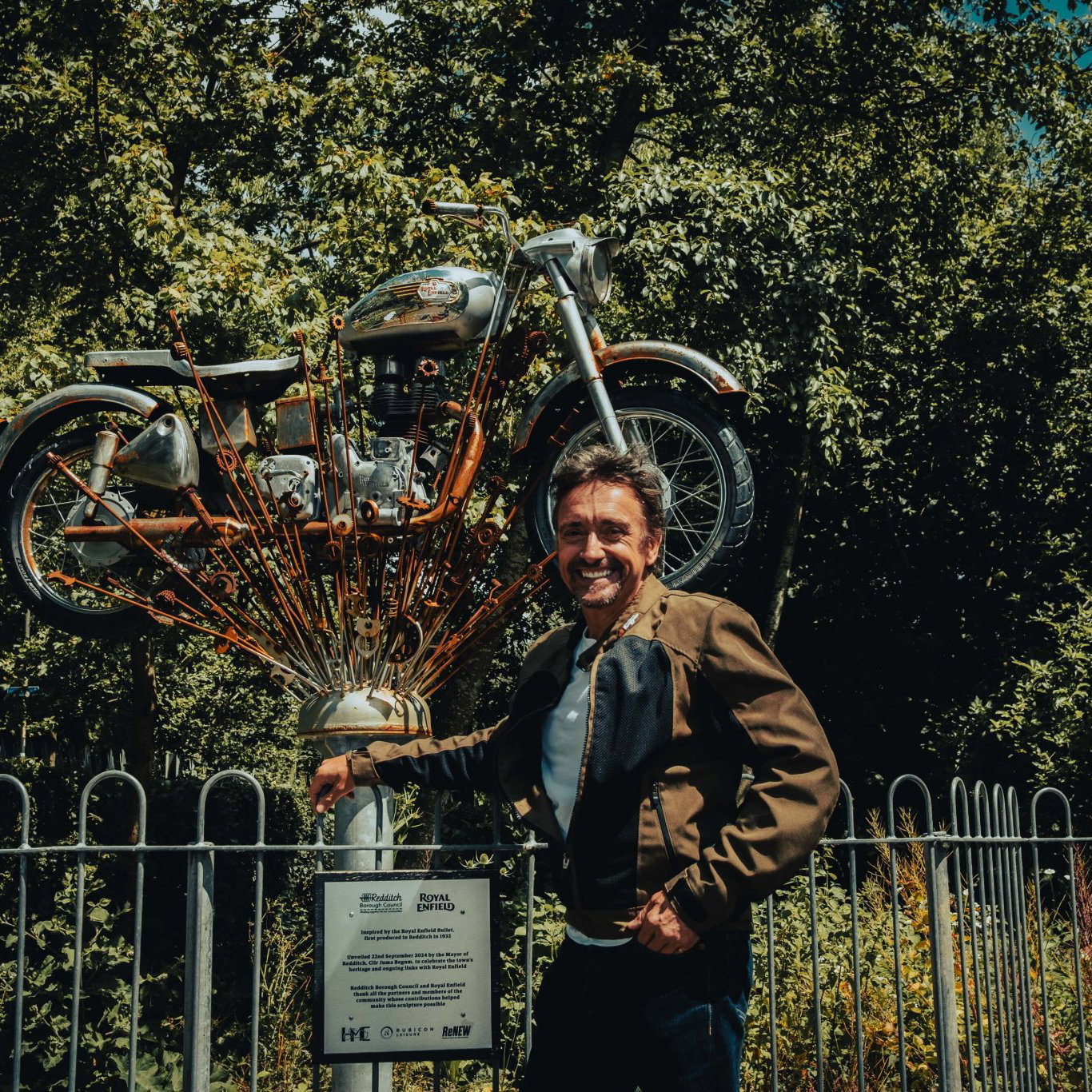 Royal Enfield motorcycle behind Richard Hammond.