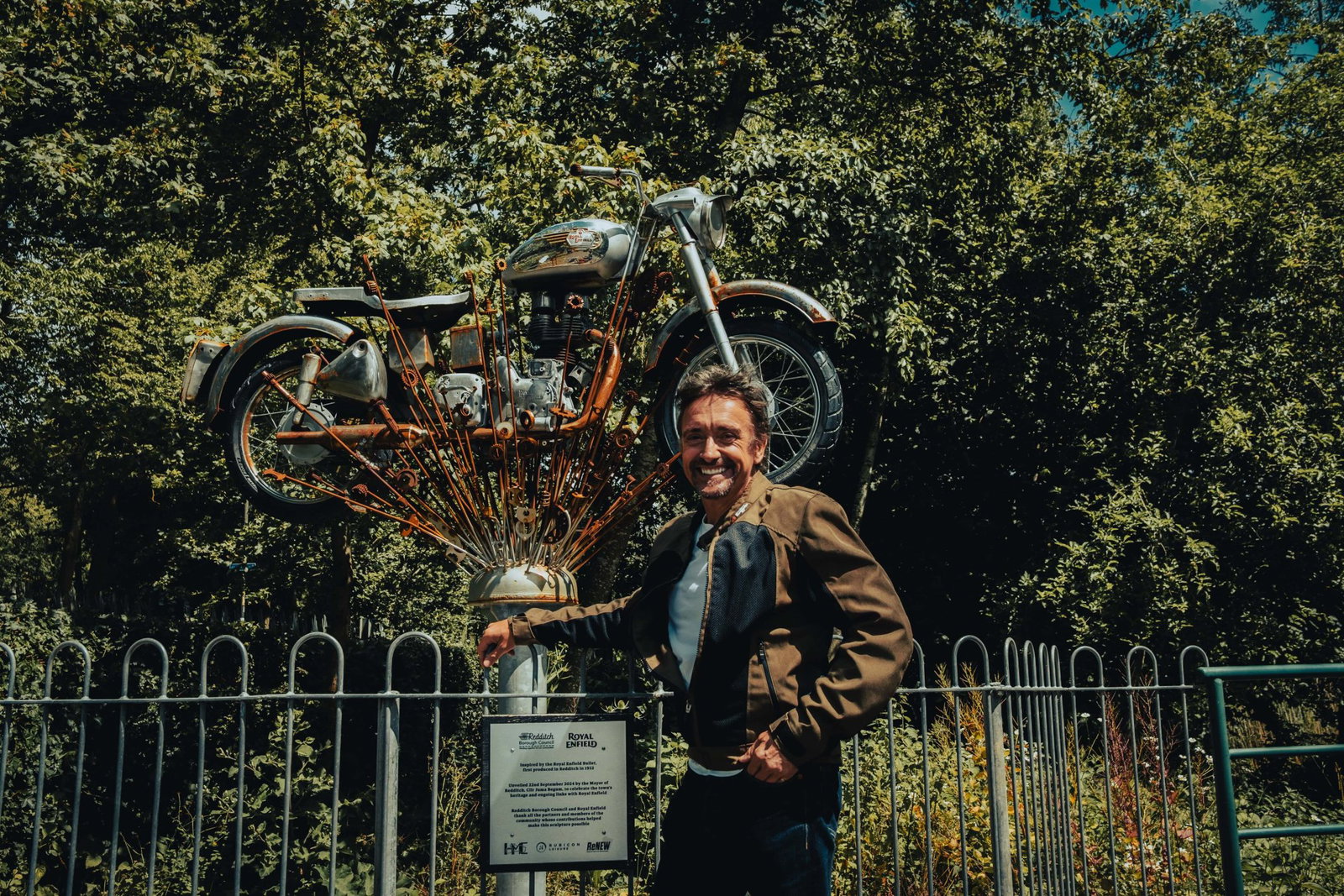 Royal Enfield motorcycle behind Richard Hammond.