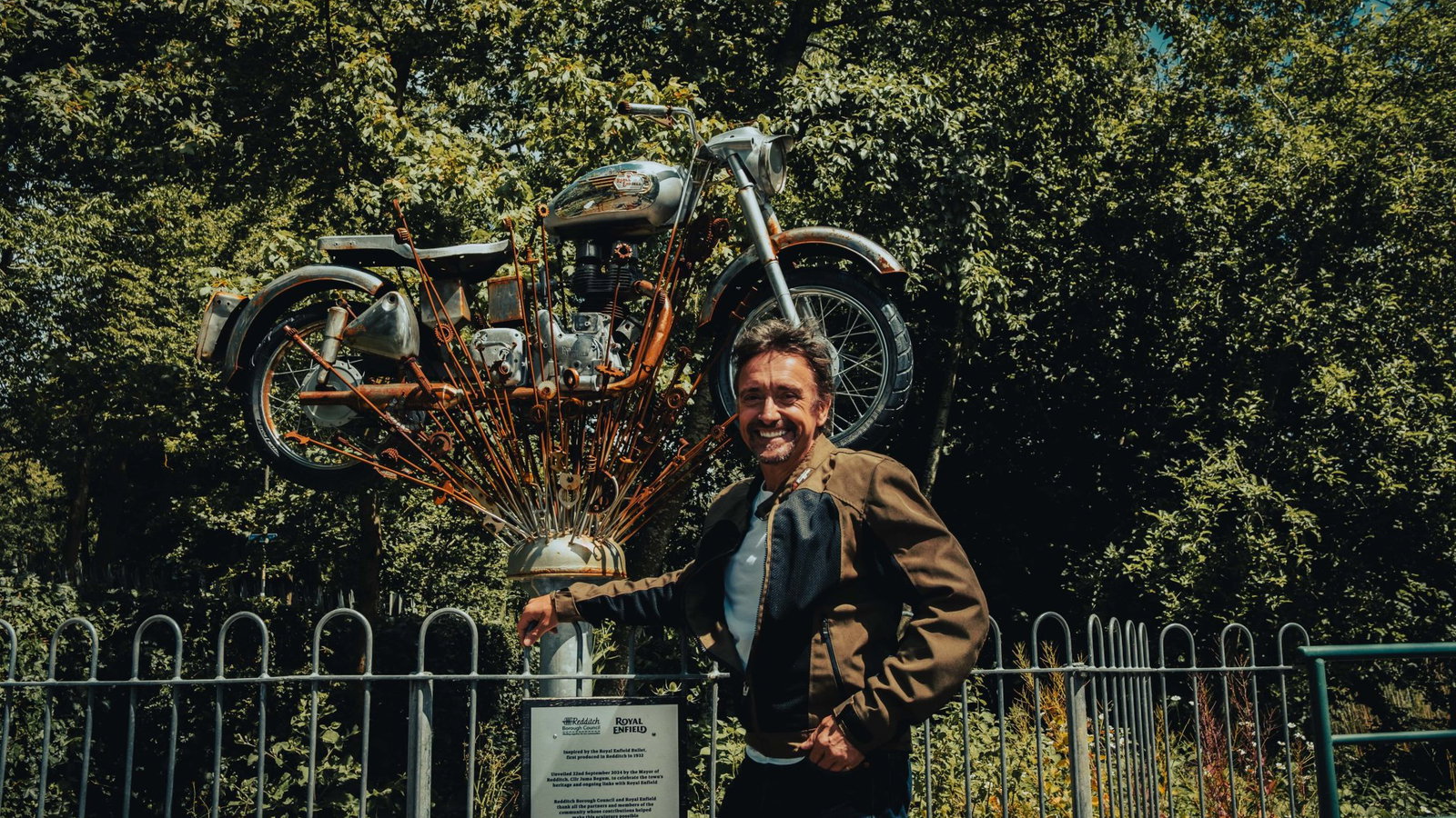 Royal Enfield motorcycle behind Richard Hammond.