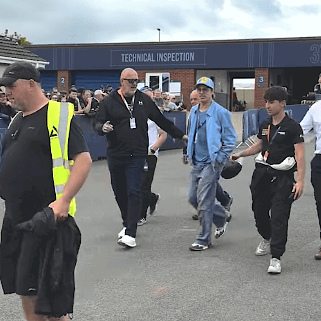 Brad Pitt in the paddock at the Isle of Man TT