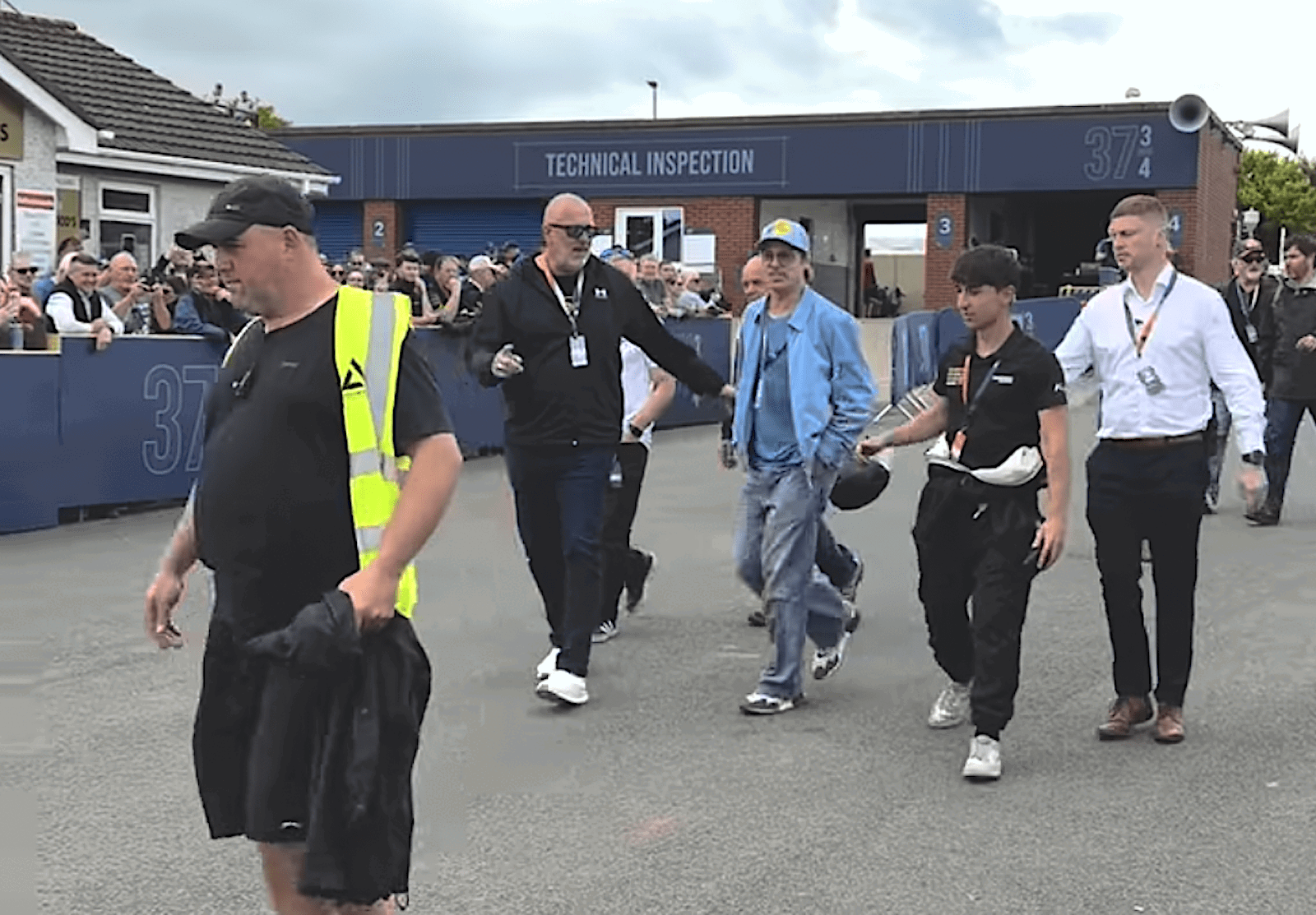 Brad Pitt in the paddock at the Isle of Man TT