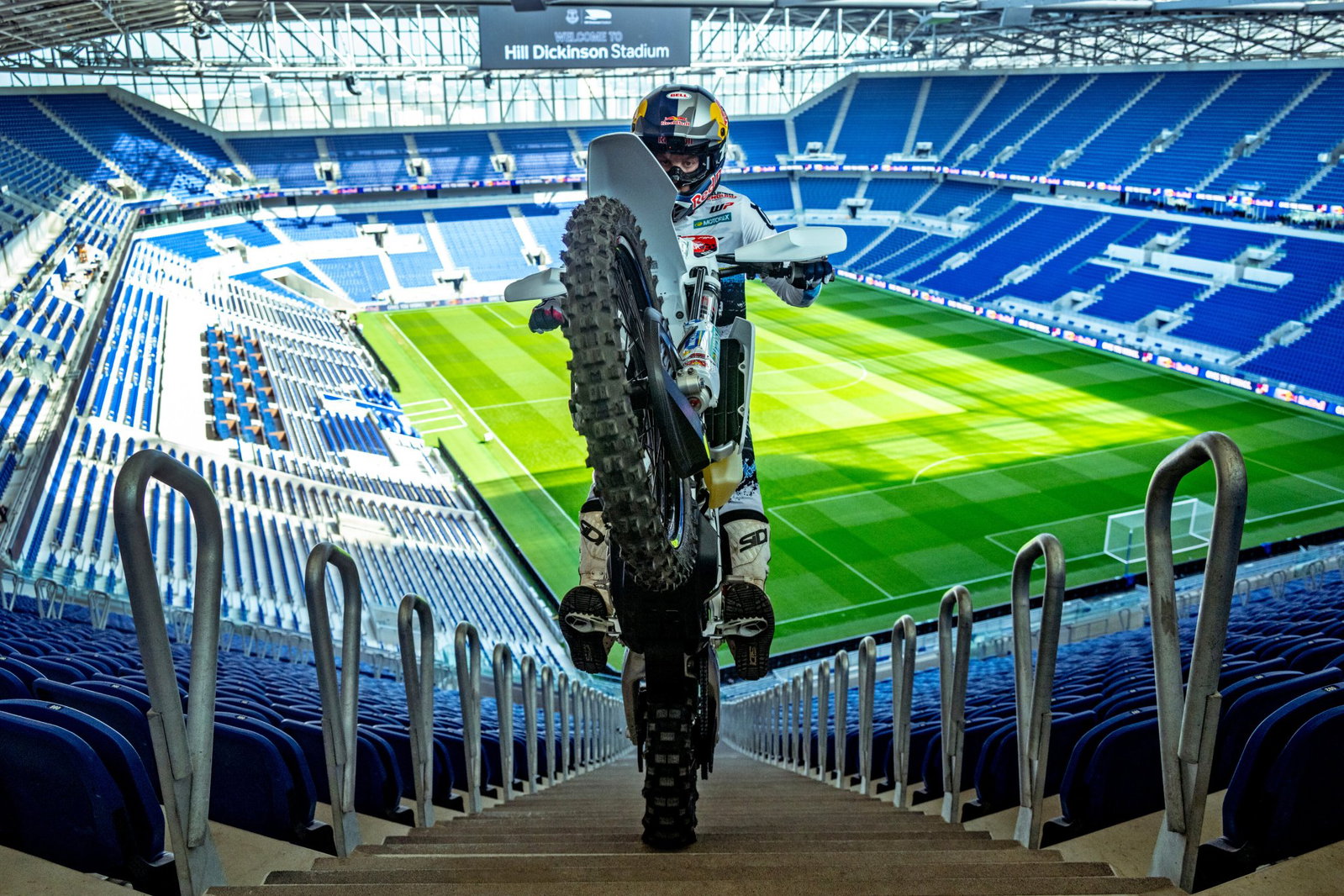 Billy Bolt pulling a wheelie up the stadium steps