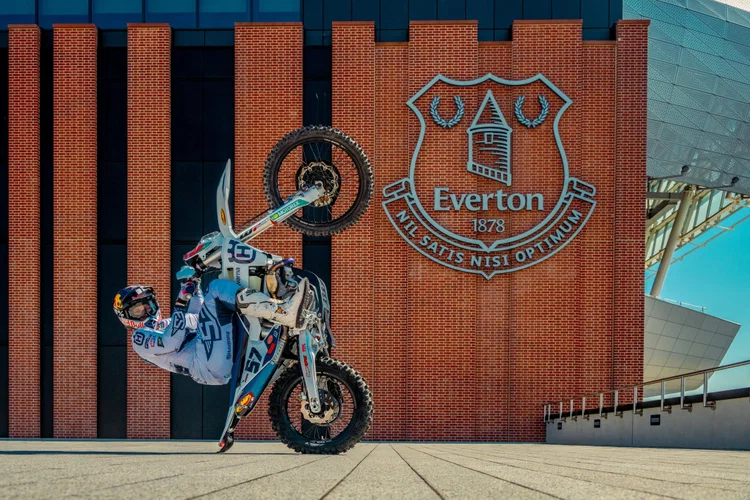 Billy Bolt performing a wheelie outside the new Everton stadium
