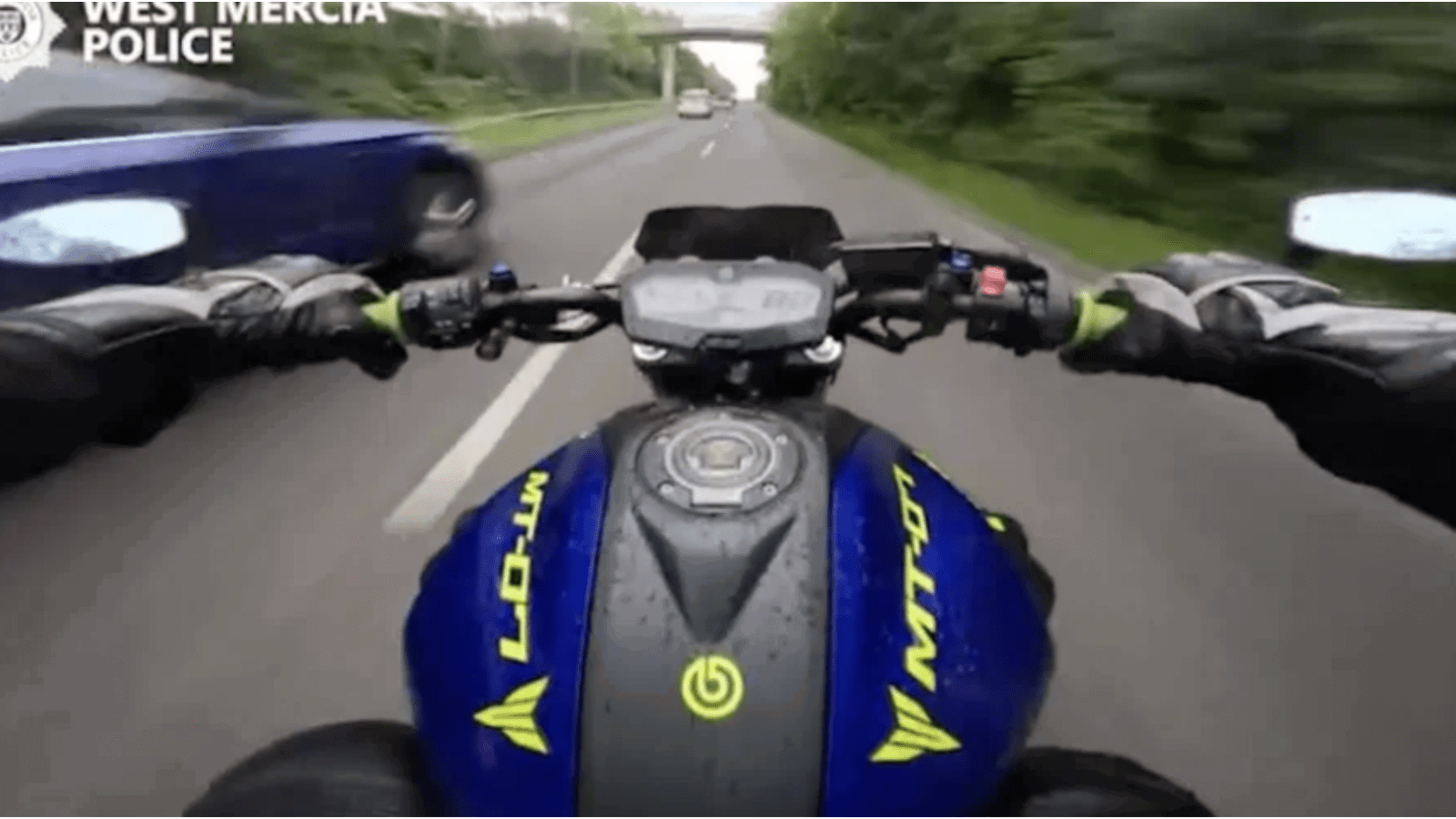Motorcyclist speeding in the UK.